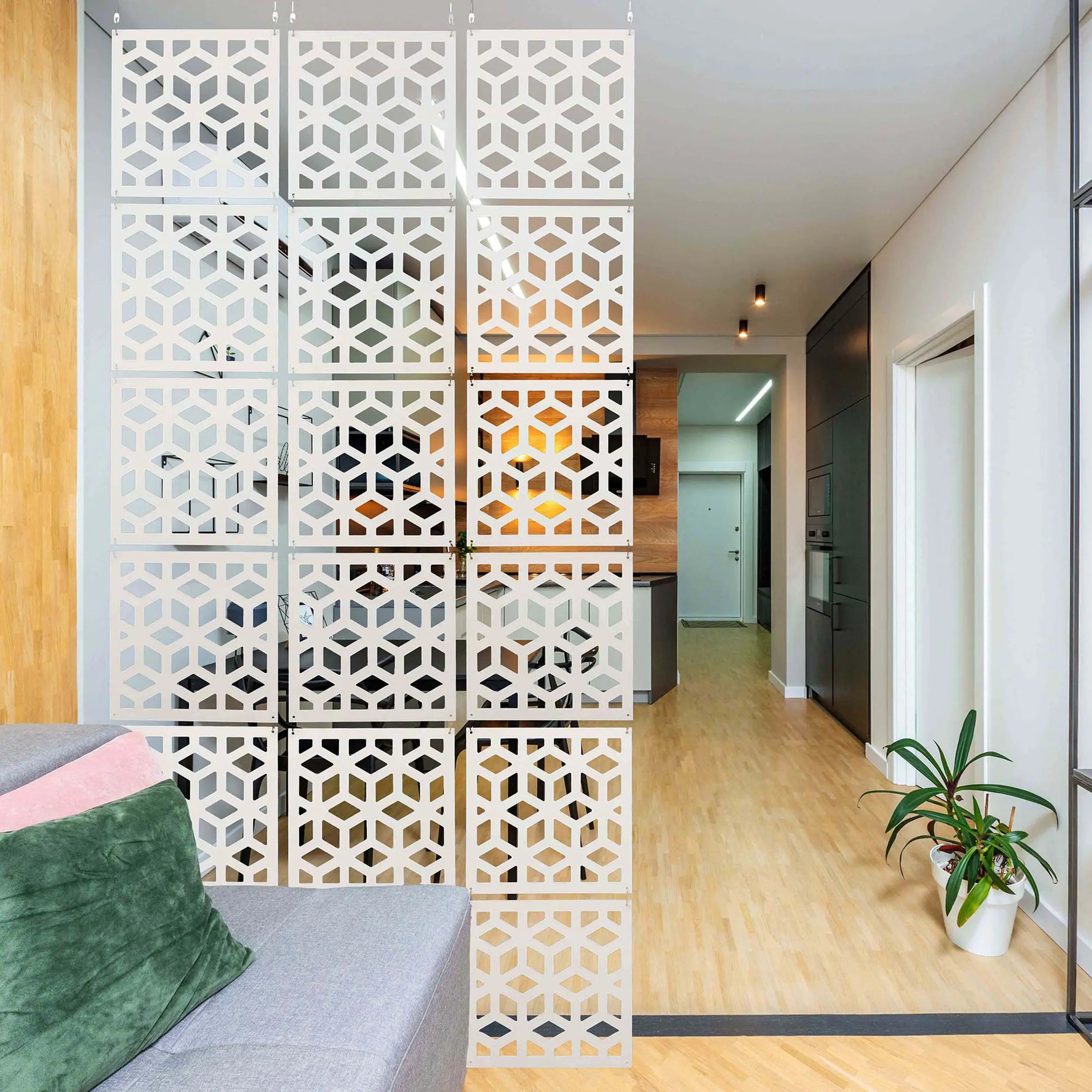 Decorative screen with geometric pattern in a modern interior setting