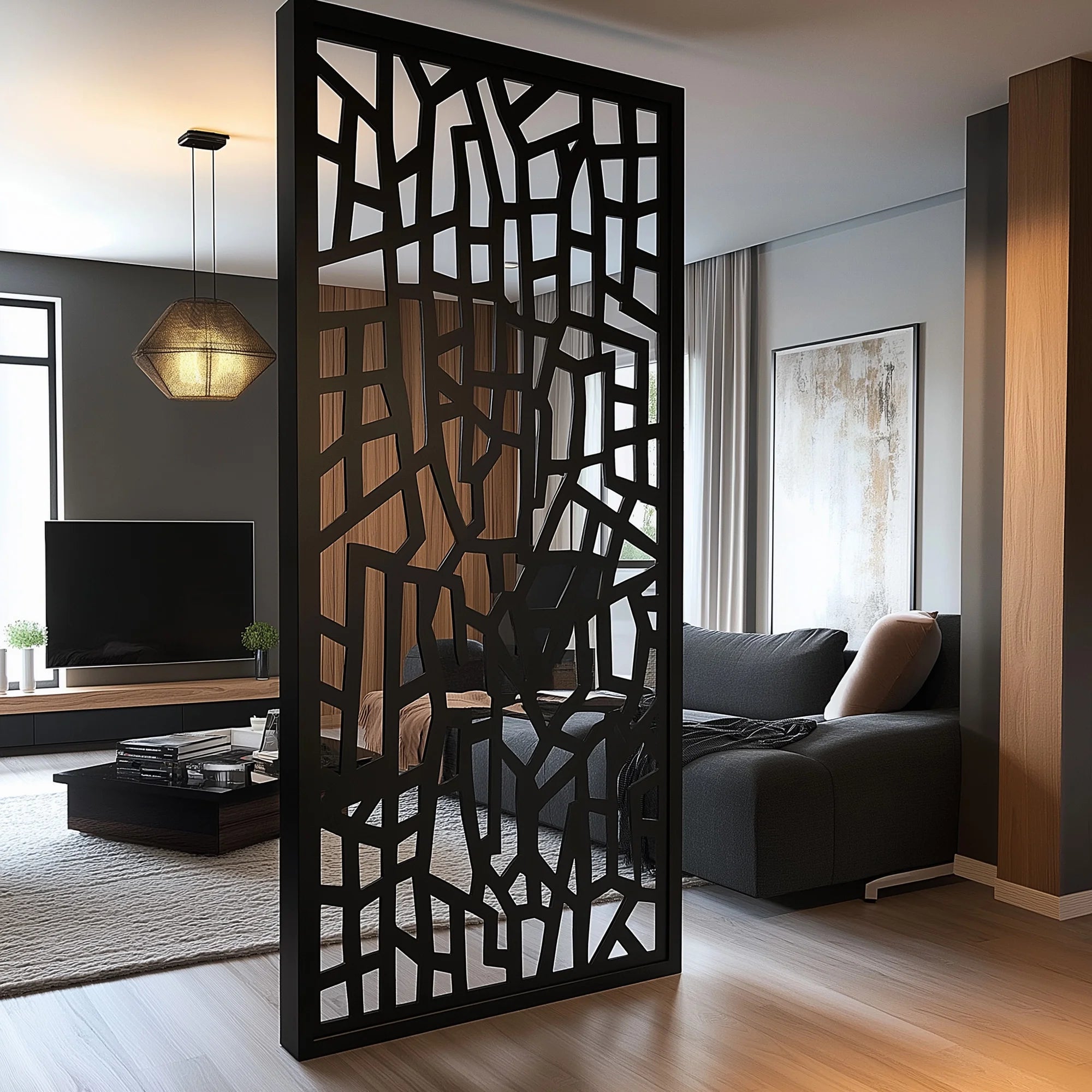Modern living room with a decorative black screen partition.