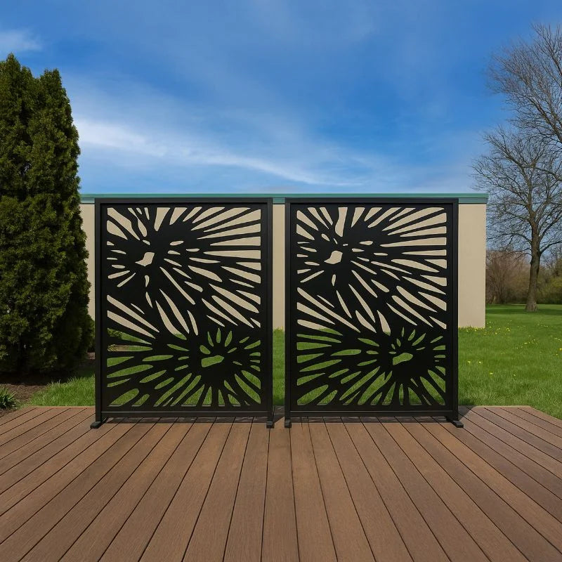 Decorative metal screen with sunburst pattern on a wooden deck