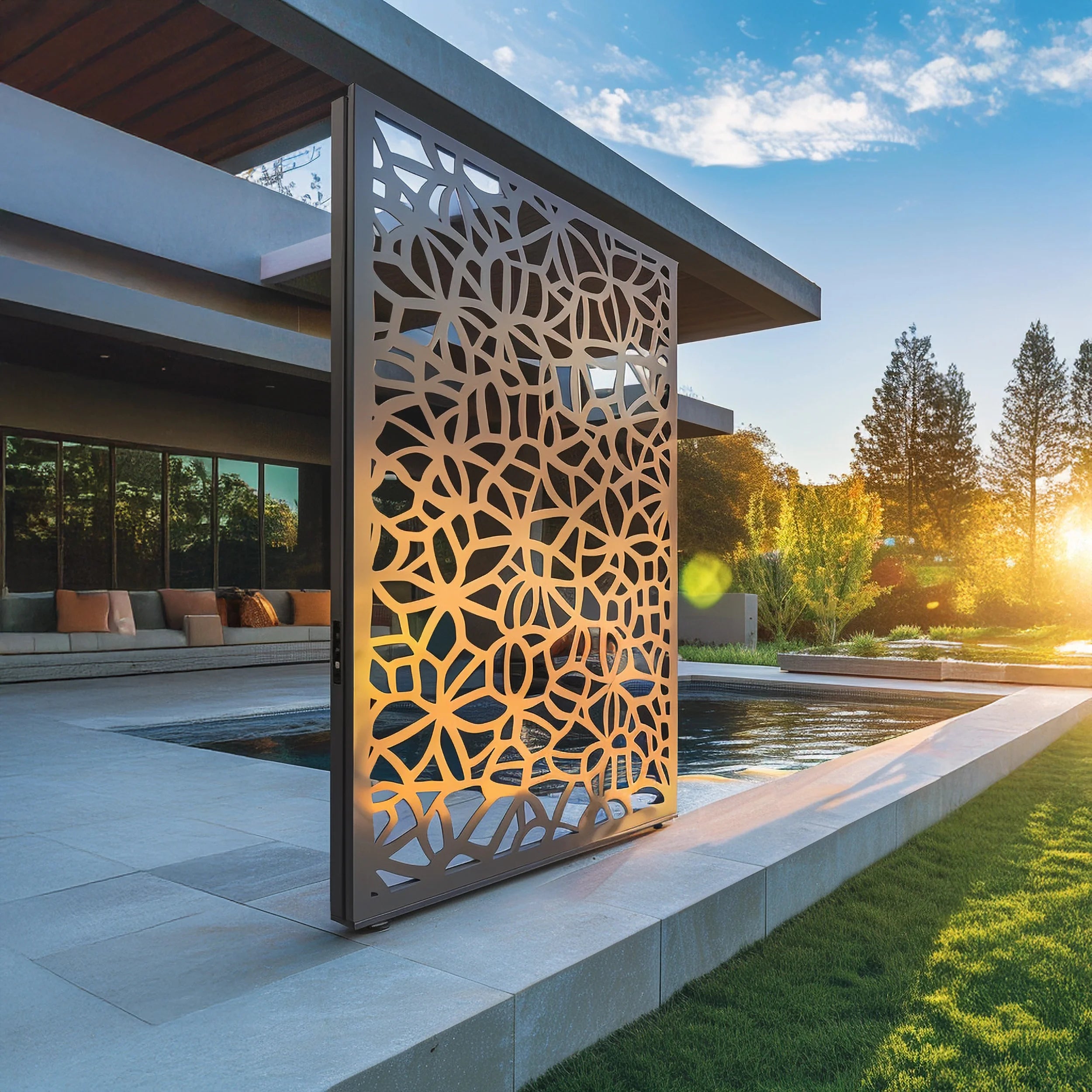 Decorative metal screen with geometric pattern in an outdoor setting