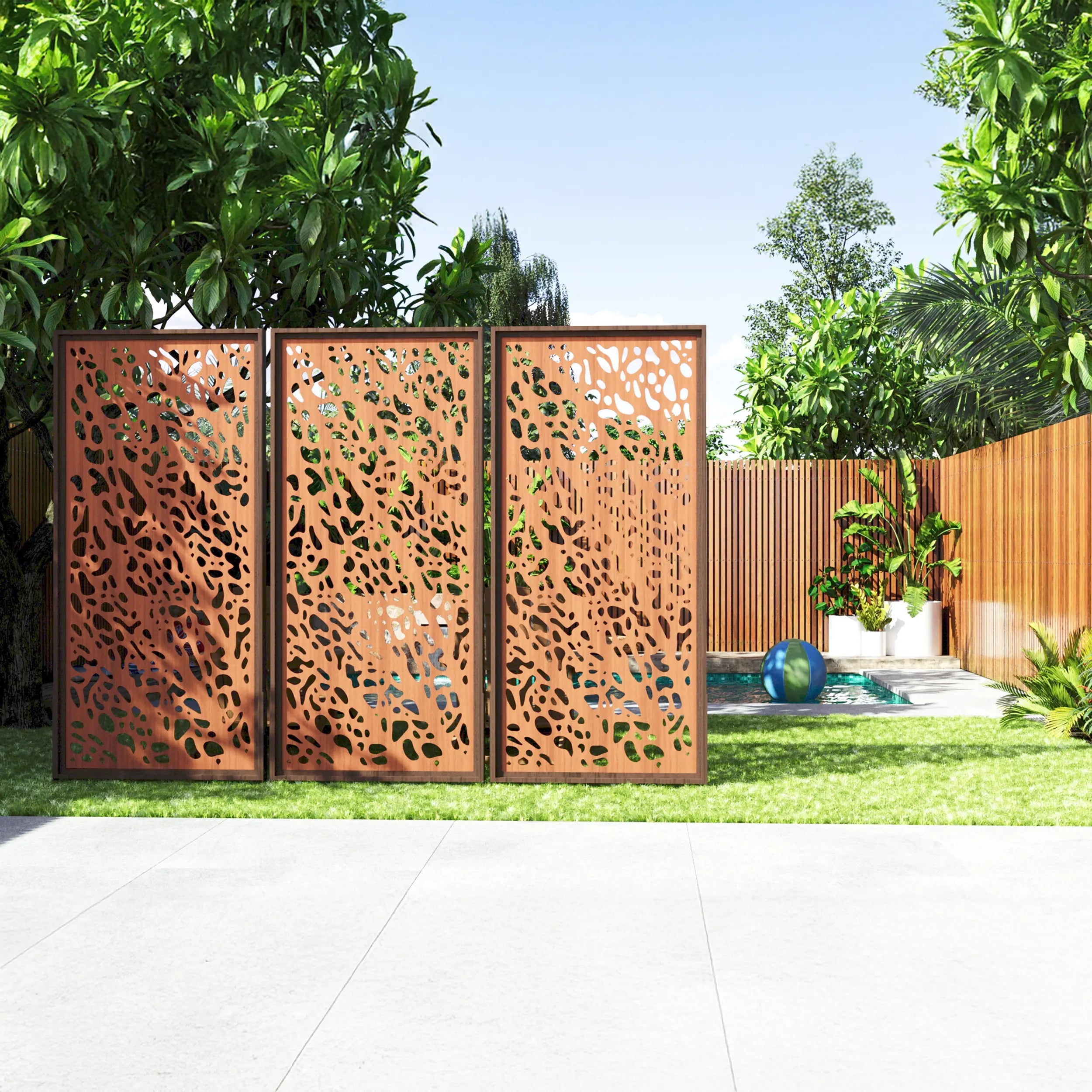 Decorative outdoor screen panels in a garden setting with plants and a pool.