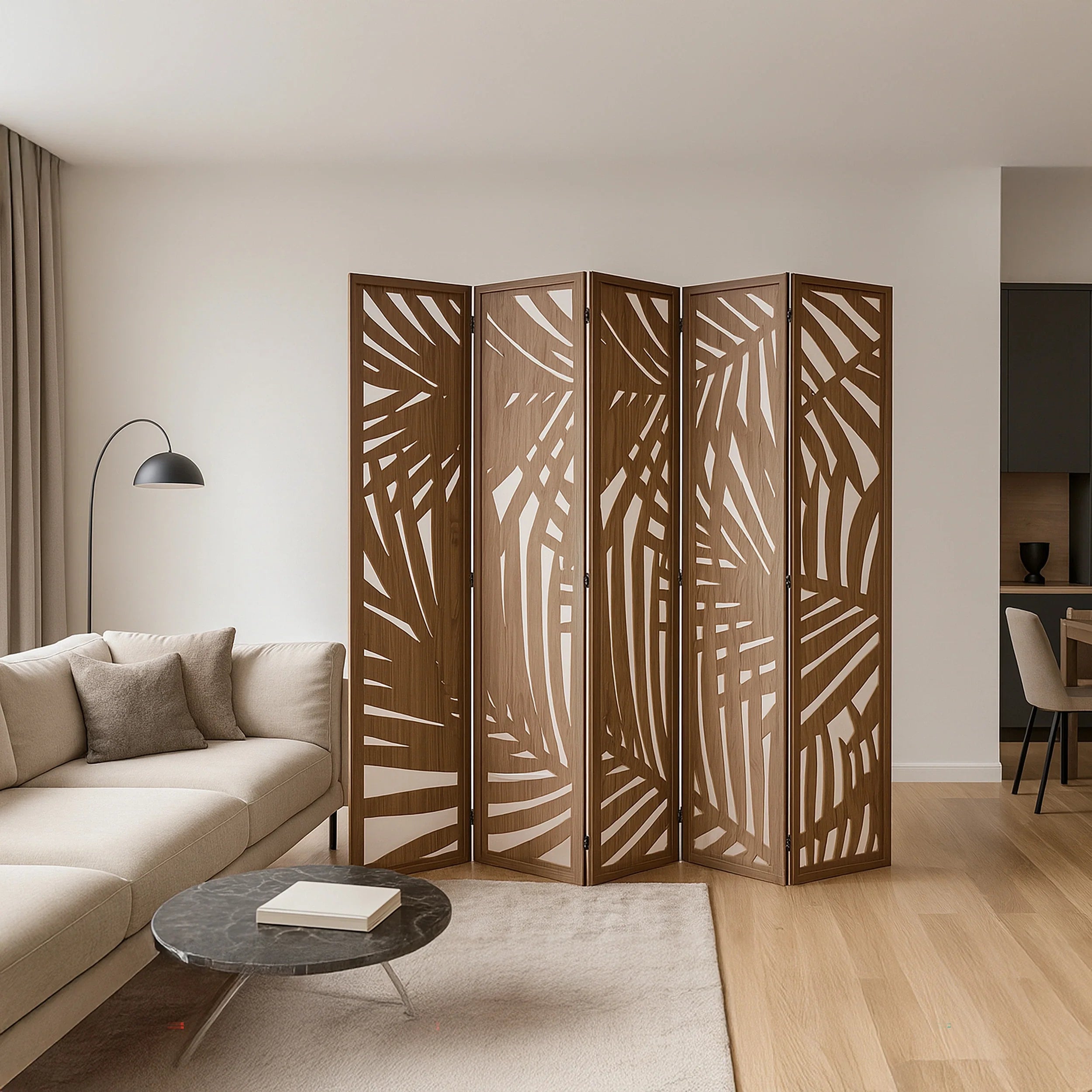 A four-panel folding room divider with a warm brown wood finish and intricate palm leaf cutouts, styled in a modern living room setting.