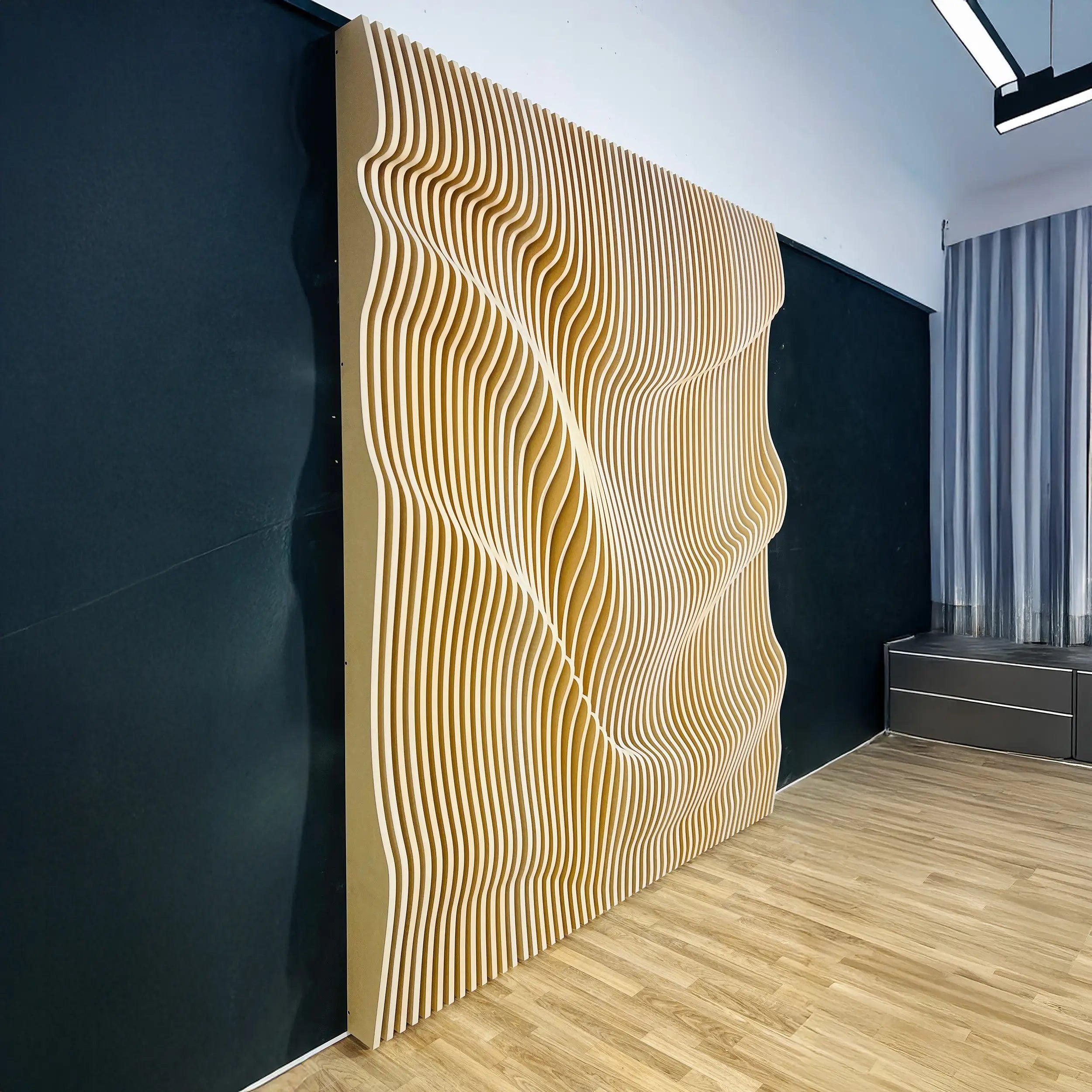 Wooden wall panel with wavy design in a modern interior setting