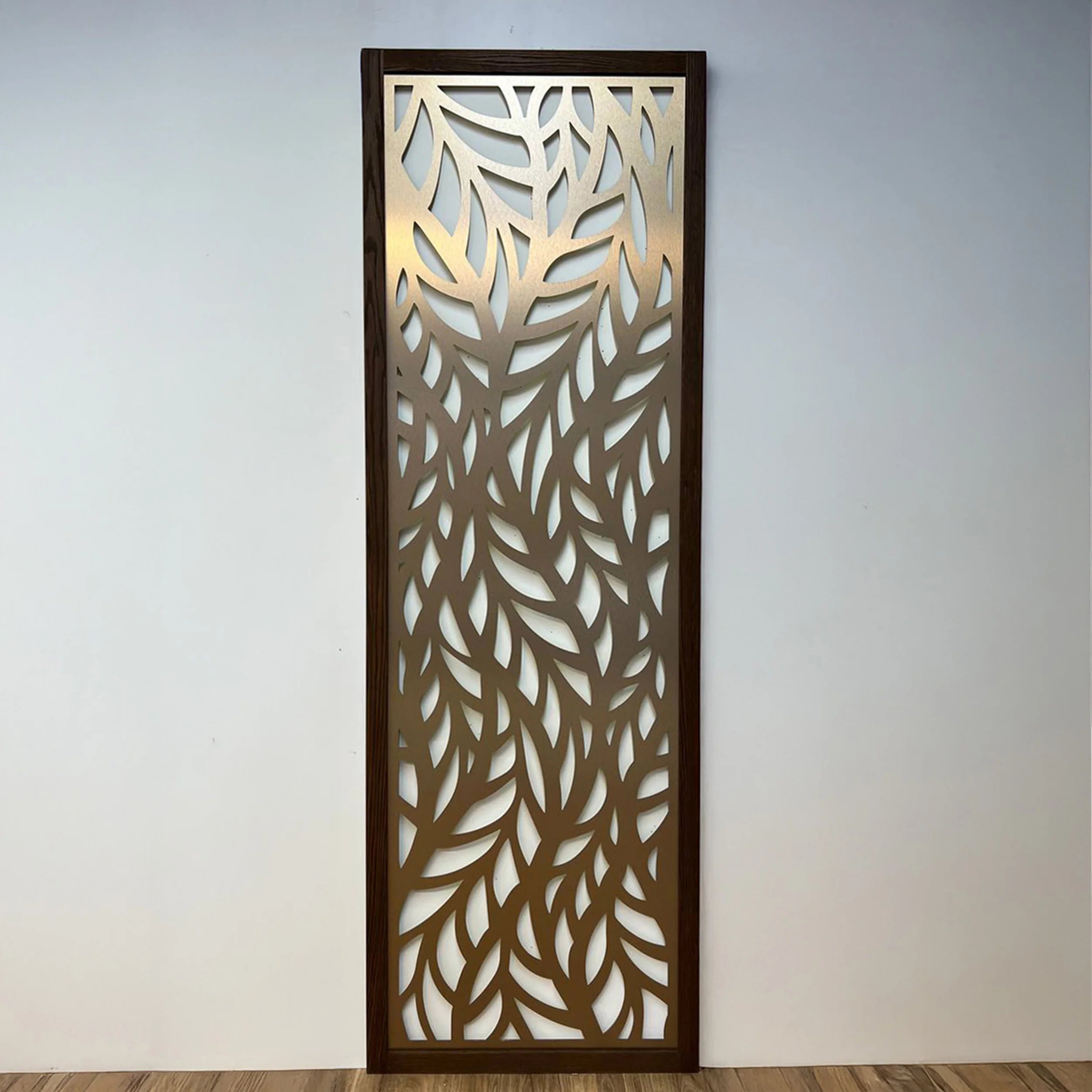 Decorative wall panel with leaf pattern on a plain background