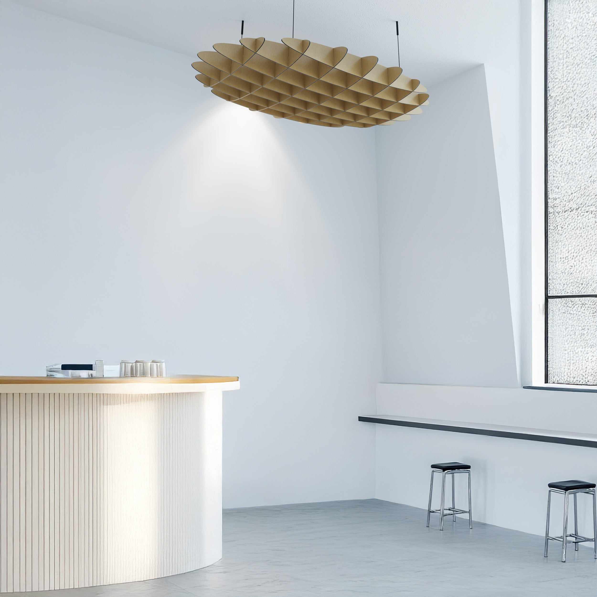 Modern interior with a wooden pendant light, white walls, and a minimalistic design.