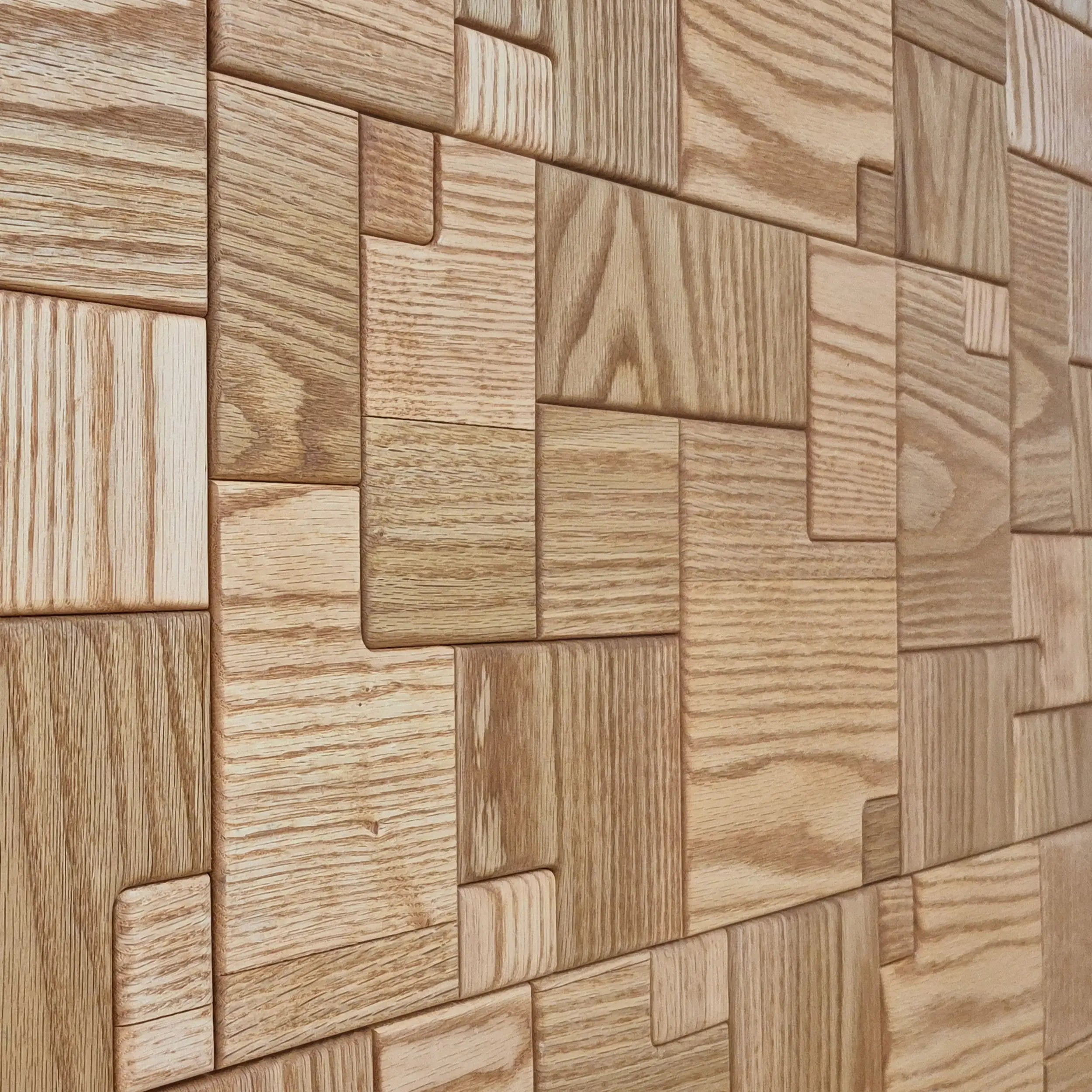 Wooden panel wall with a pattern of square and rectangular pieces.