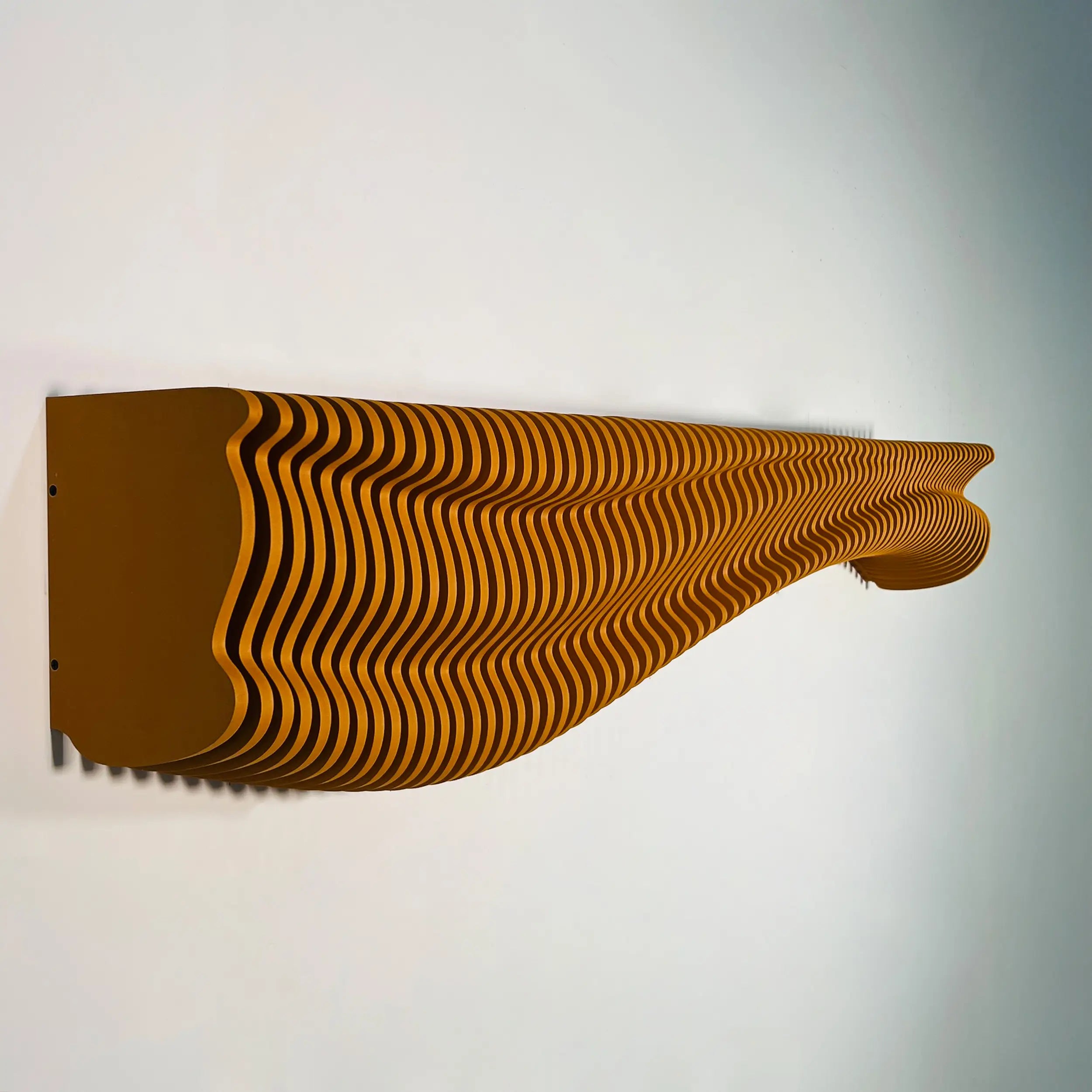 Wavy wooden shelf on a plain wall