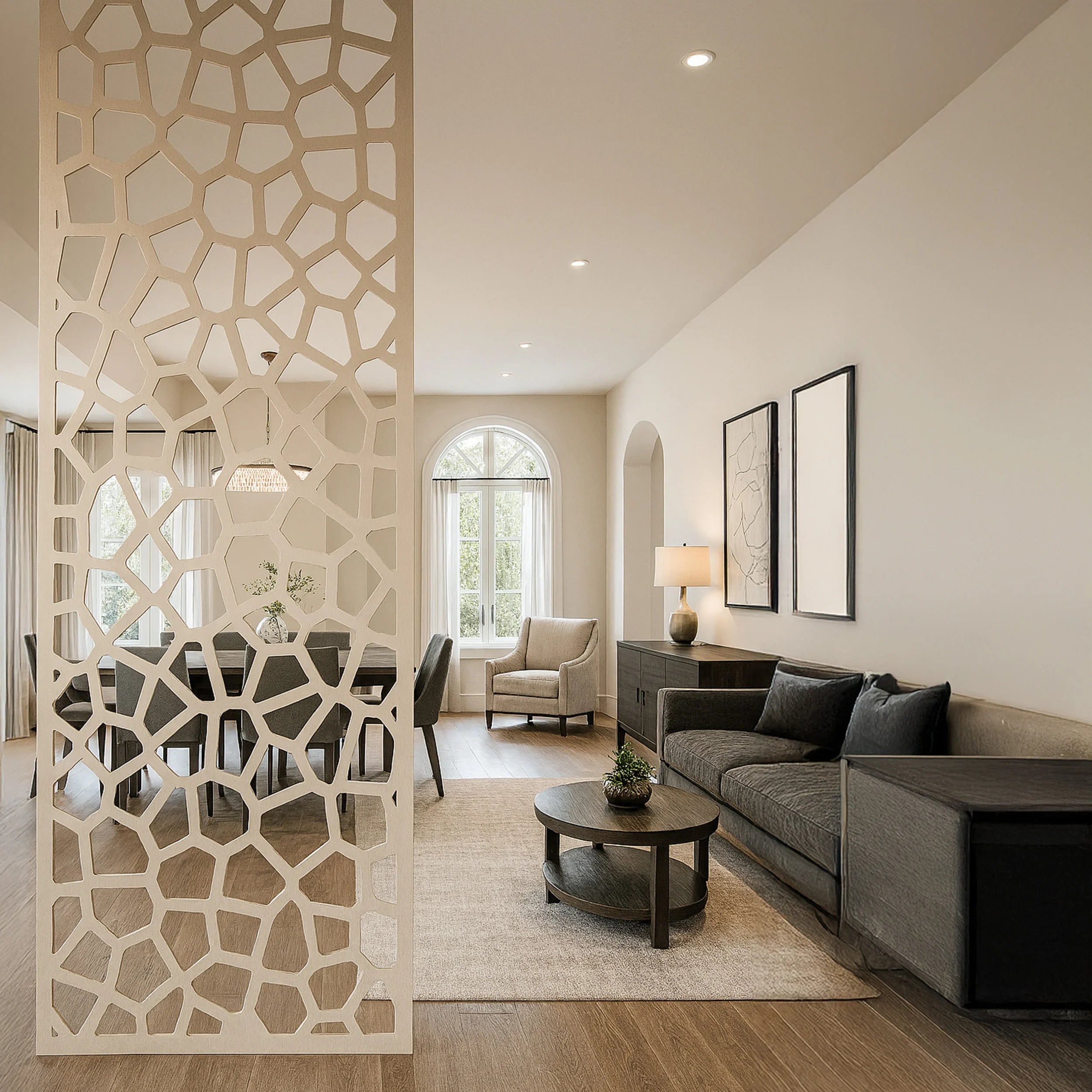 Modern living room with decorative screen, sofa, and dining area.