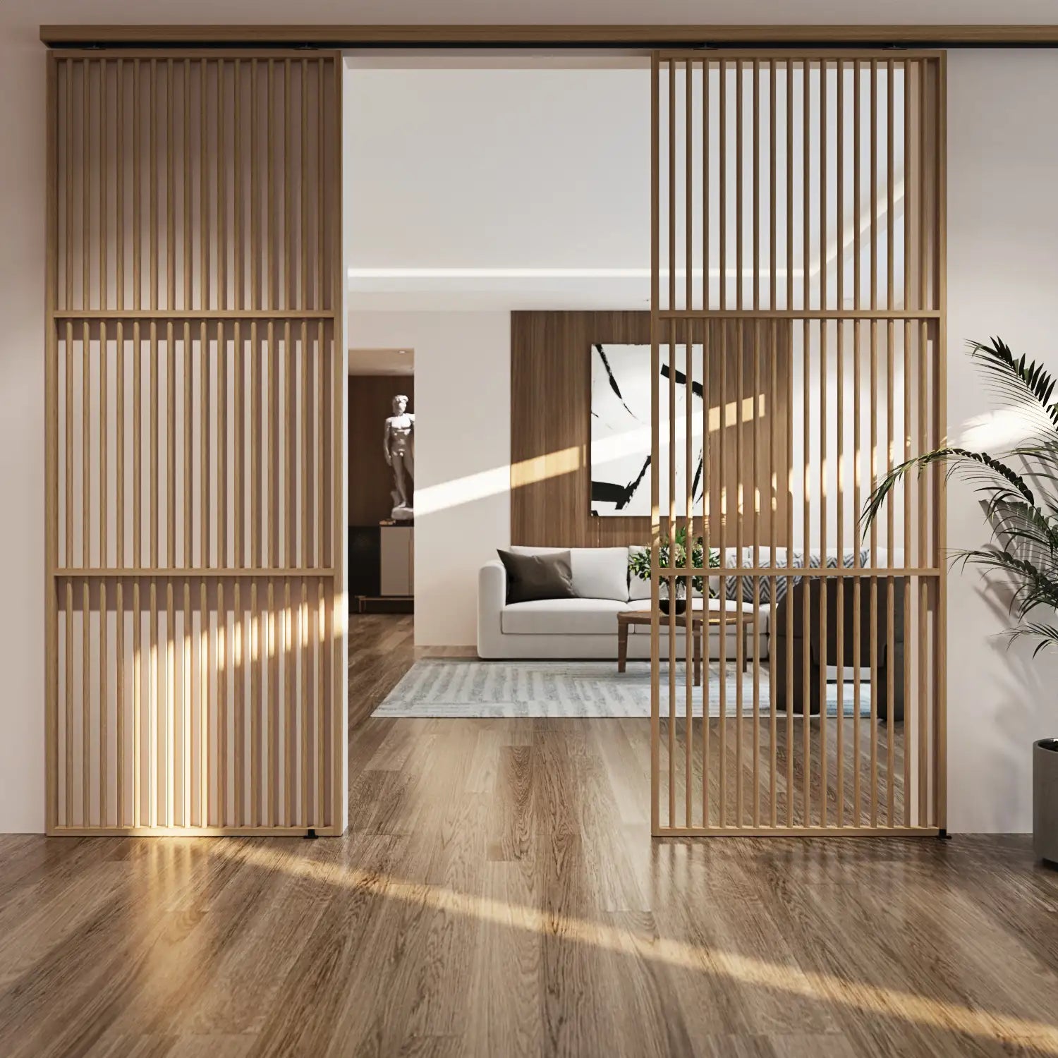A modern wooden slat screen divider installed in a minimalist living room, separating a hallway from a furnished living area with a sofa, rug, and wall art.