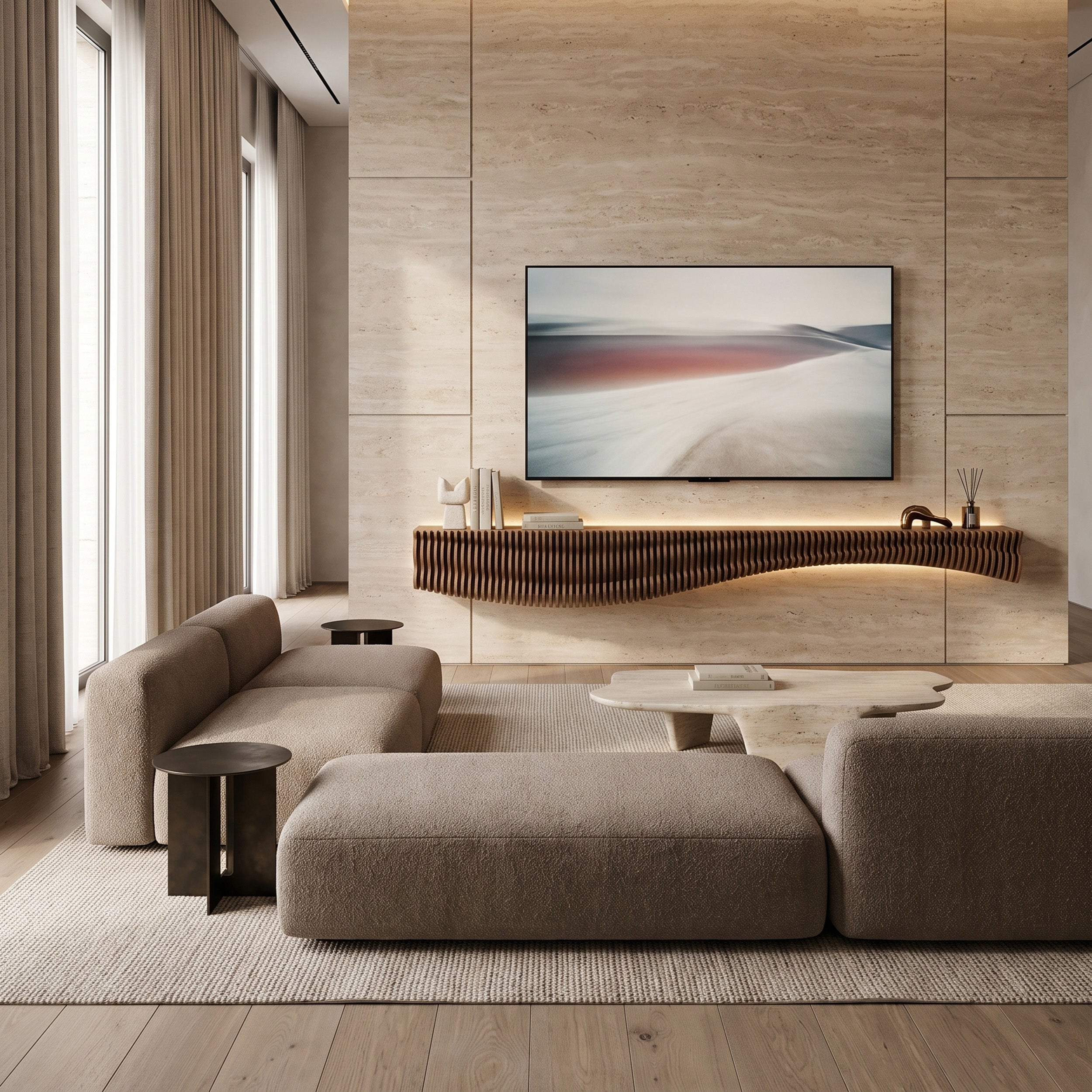 A modern living room with a low-profile flat-screen TV mounted on a light wood-paneled wall above a floating dark wood shelf. The room features a beige sectional sofa, a matching ottoman, a low round coffee table, and a textured rug on a light wood floor.