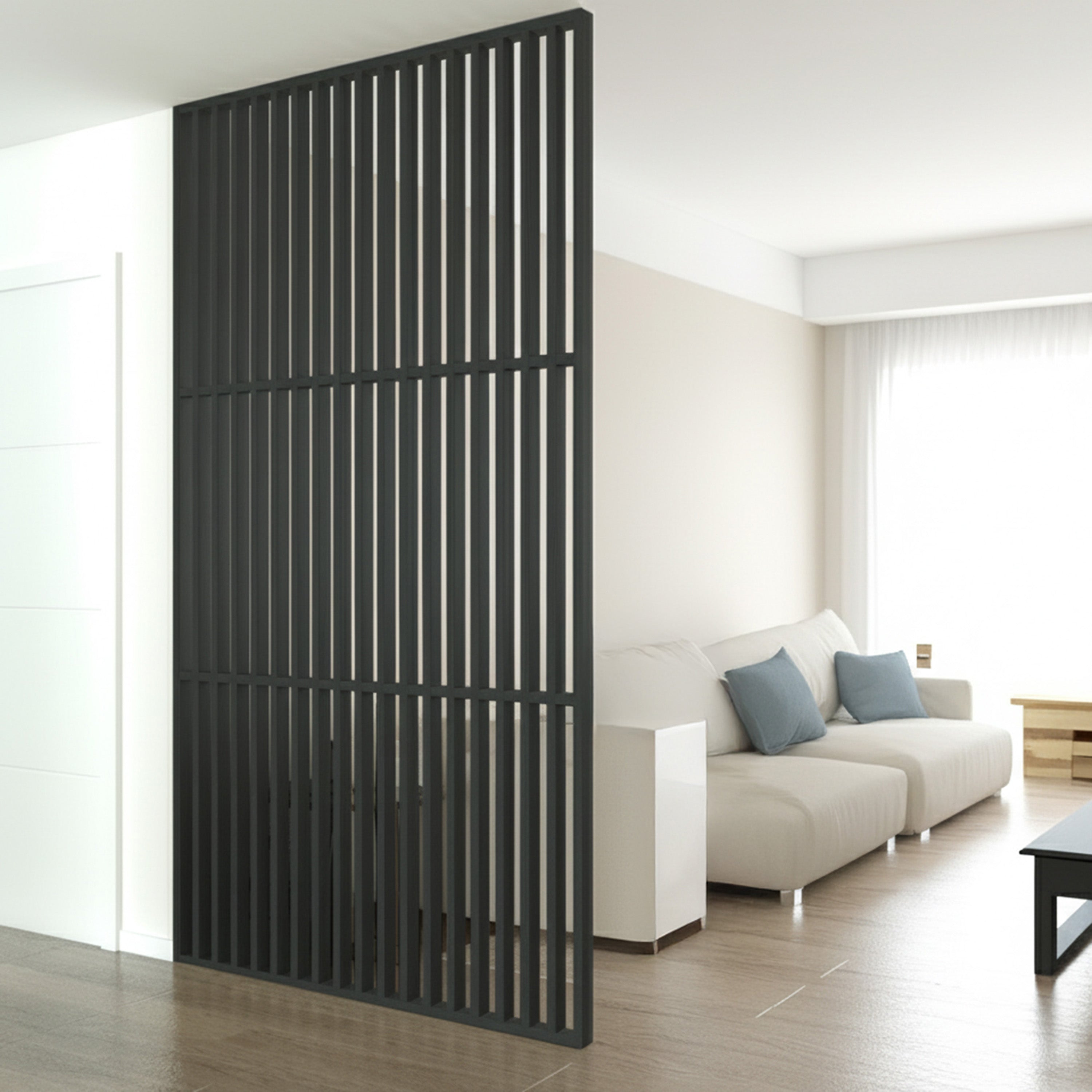 Black room divider screen in a modern living room with a sofa and coffee table.