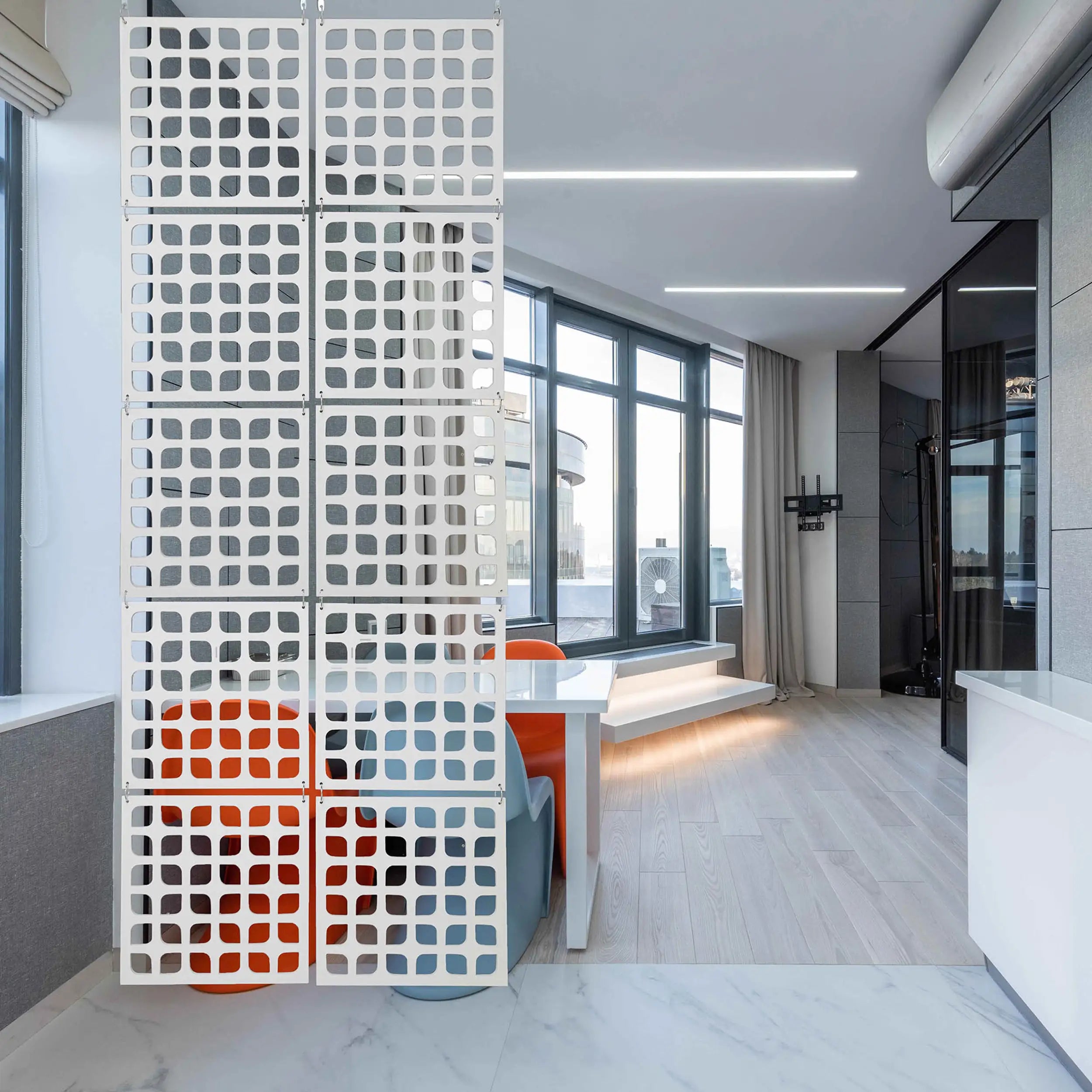 Modern office space with a decorative partition wall.