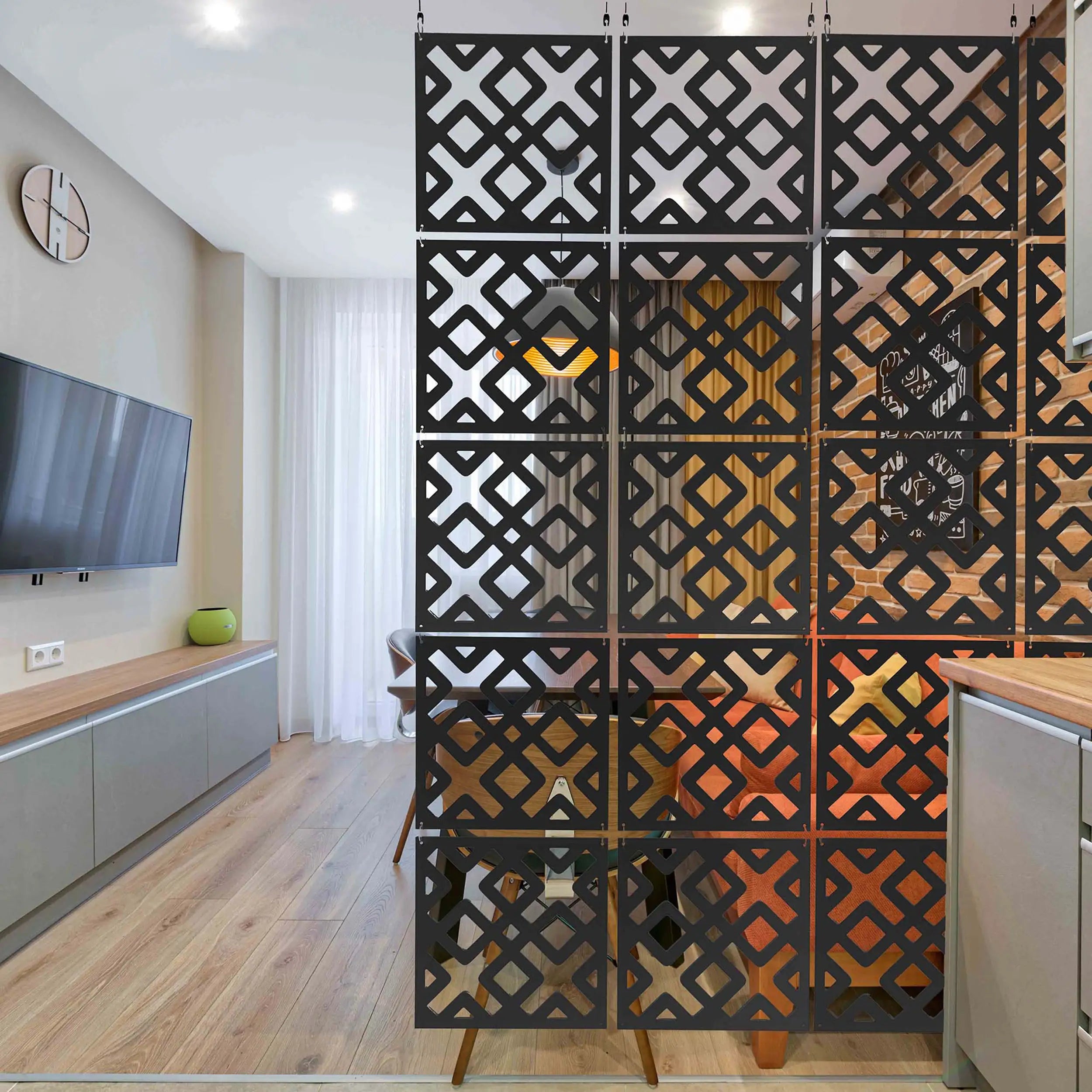 Decorative room divider with geometric patterns in a modern living room setting.