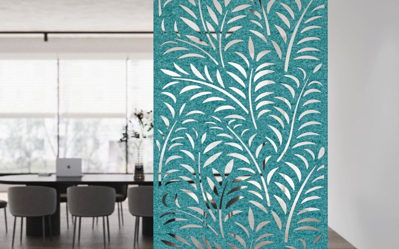 Decorative screen with leaf pattern in a modern office setting