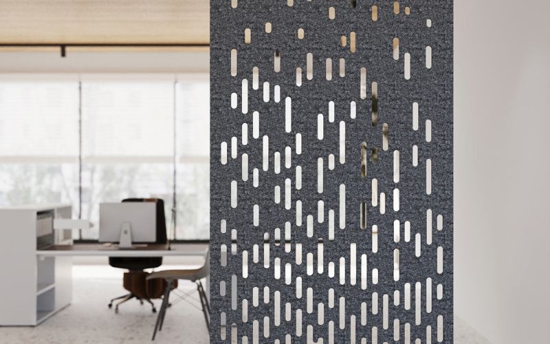 Decorative wall panel with geometric pattern in an office setting