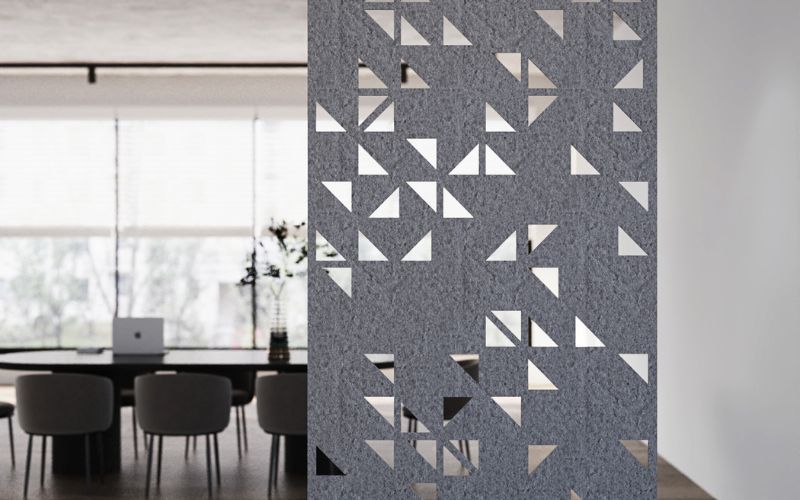 Decorative screen with geometric pattern in a modern interior setting