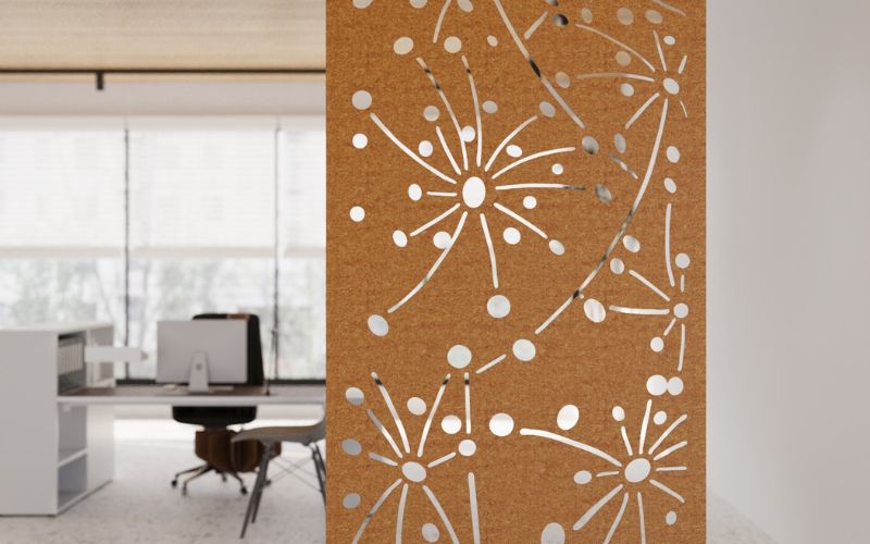 Decorative screen with floral pattern in an office setting