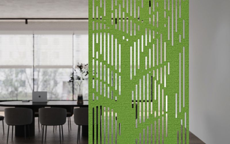 Green perforated screen in a modern office setting