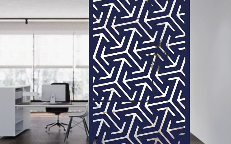 Geometric patterned room divider in an office setting