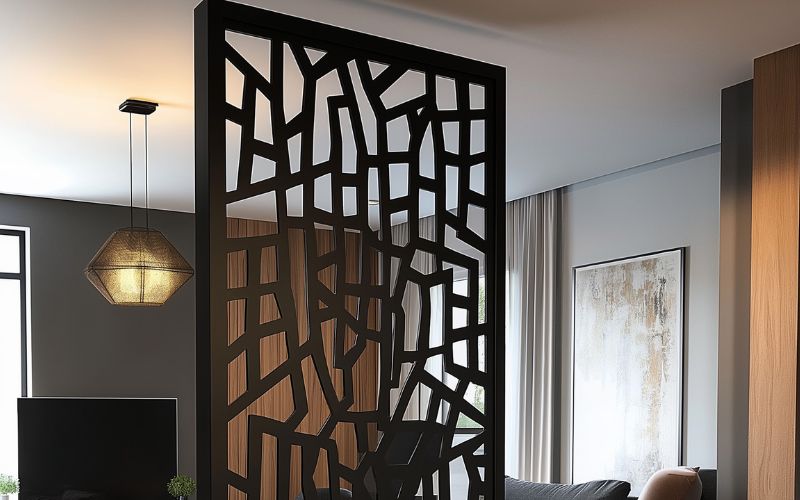 Modern room divider with geometric design in a living room setting