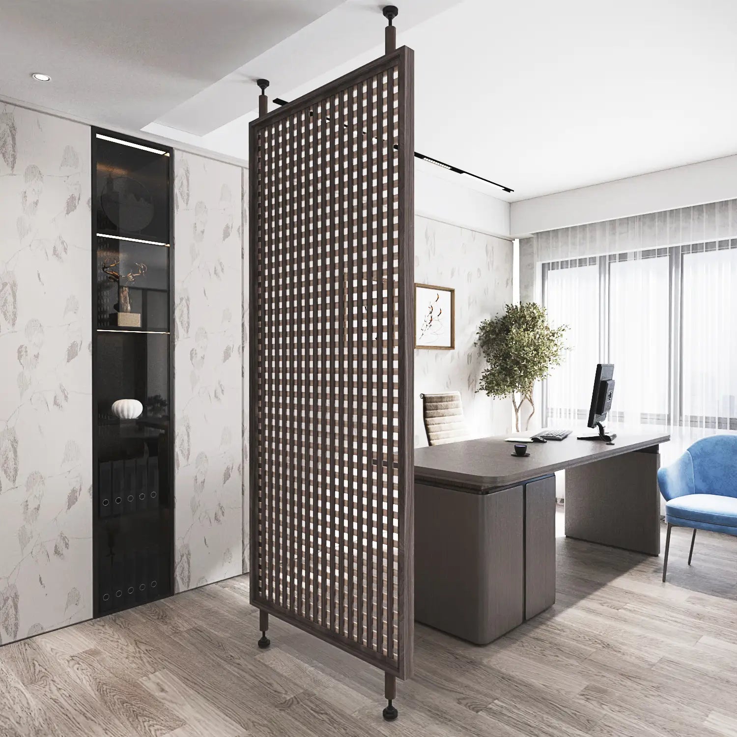 Modern office space with a decorative screen, desk, and chair.