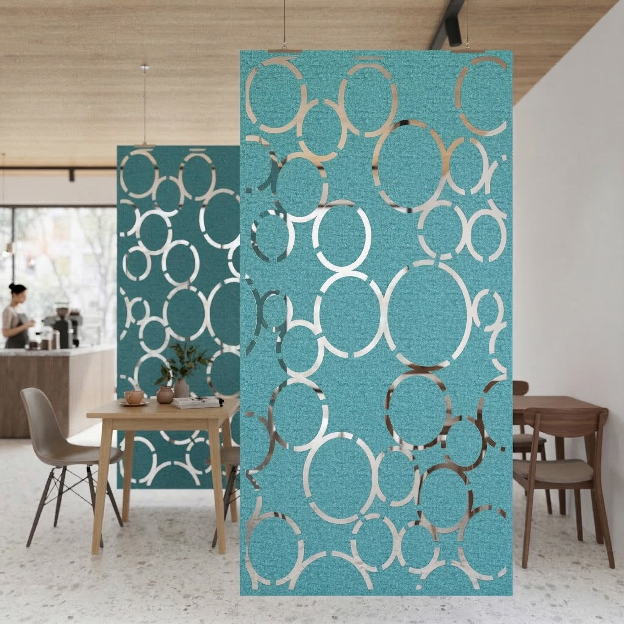 Decorative screen with circular pattern in a room with furniture and decor.
