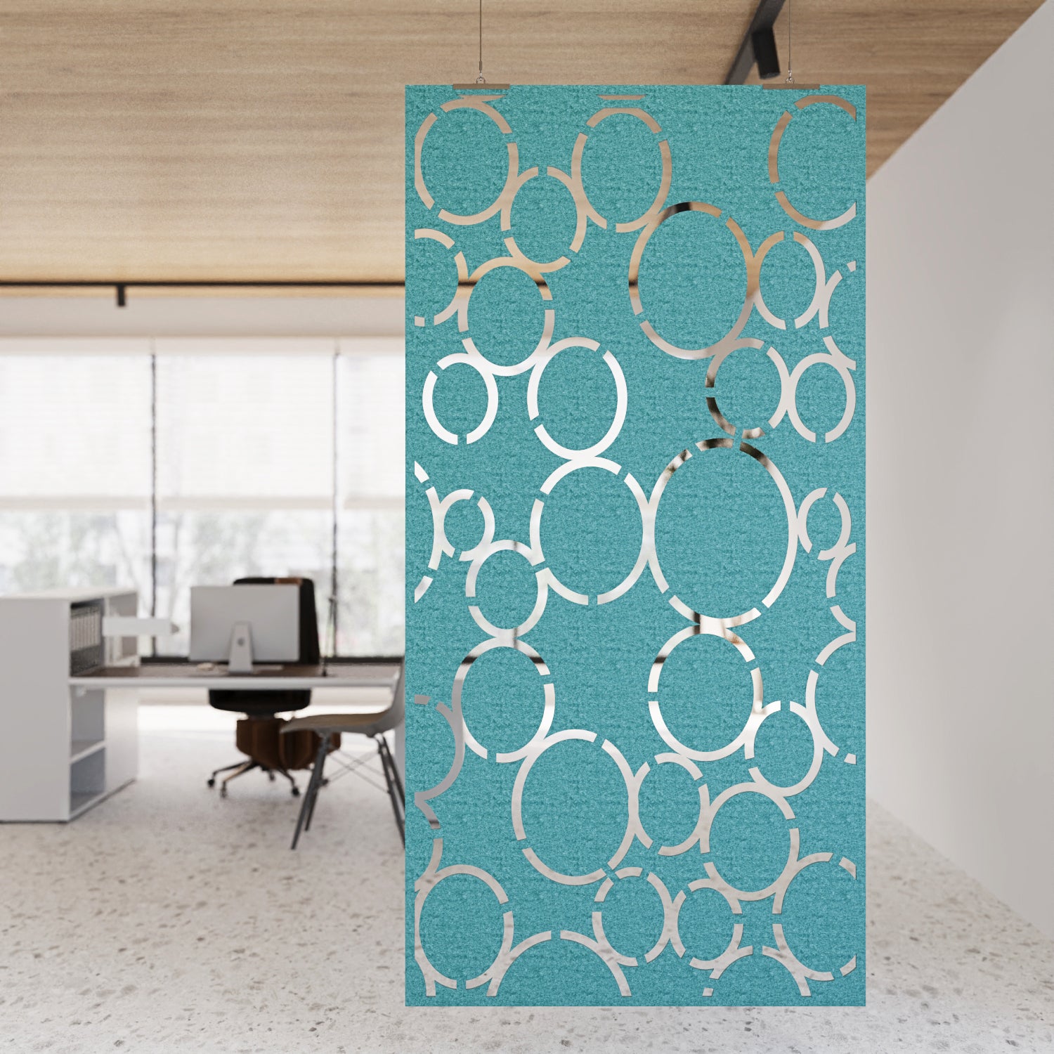 Decorative screen with circular pattern in an office setting