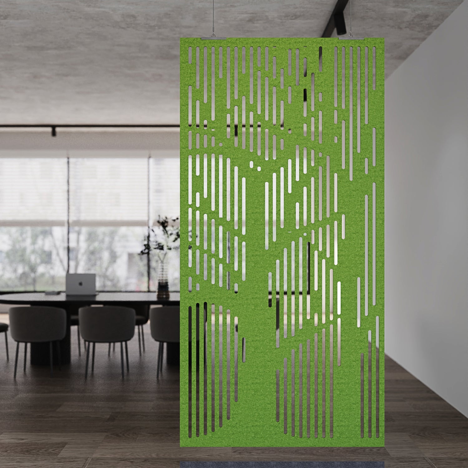 Green perforated screen in a modern office setting
