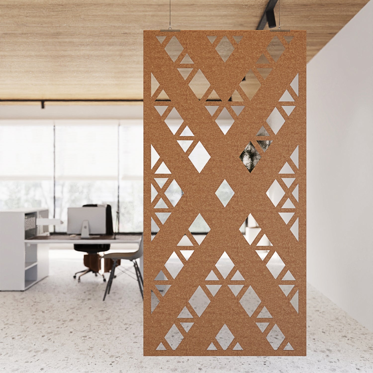 Decorative screen with geometric pattern in an office setting