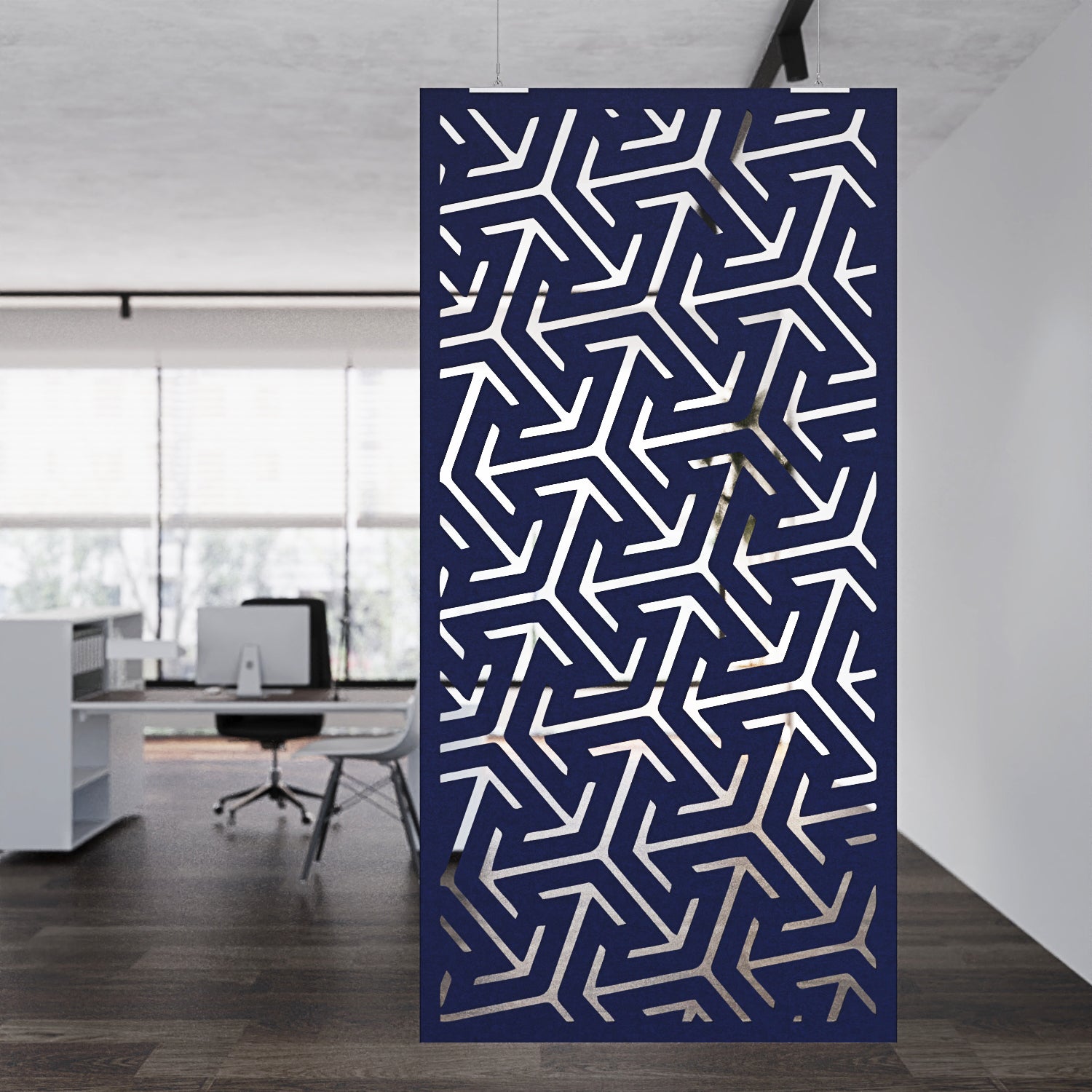 Decorative screen with geometric pattern in a modern office setting