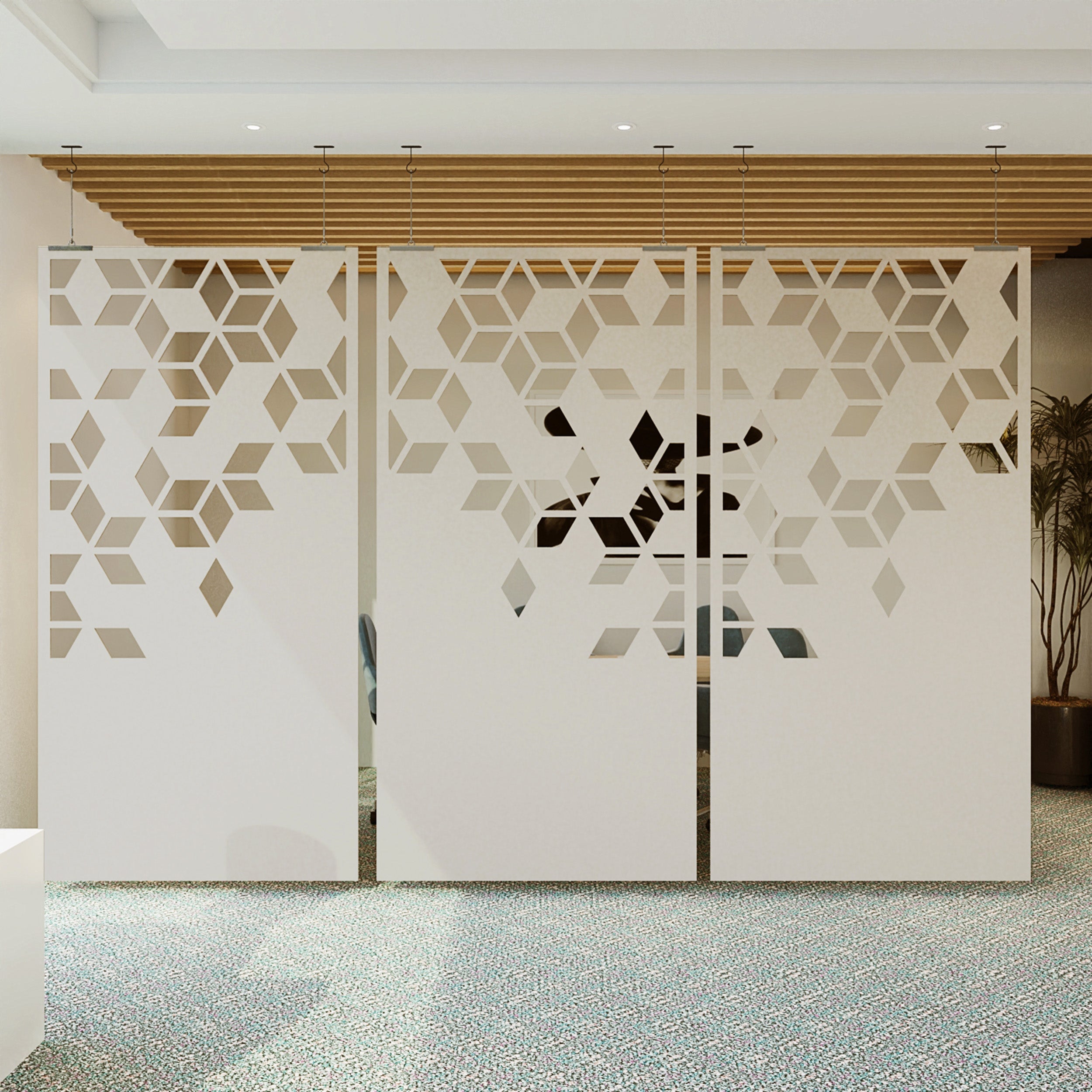 Decorative screen with geometric pattern in an indoor setting