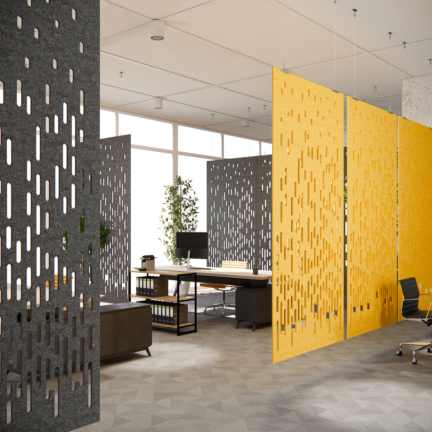 Modern office space with patterned partition walls and office furniture.