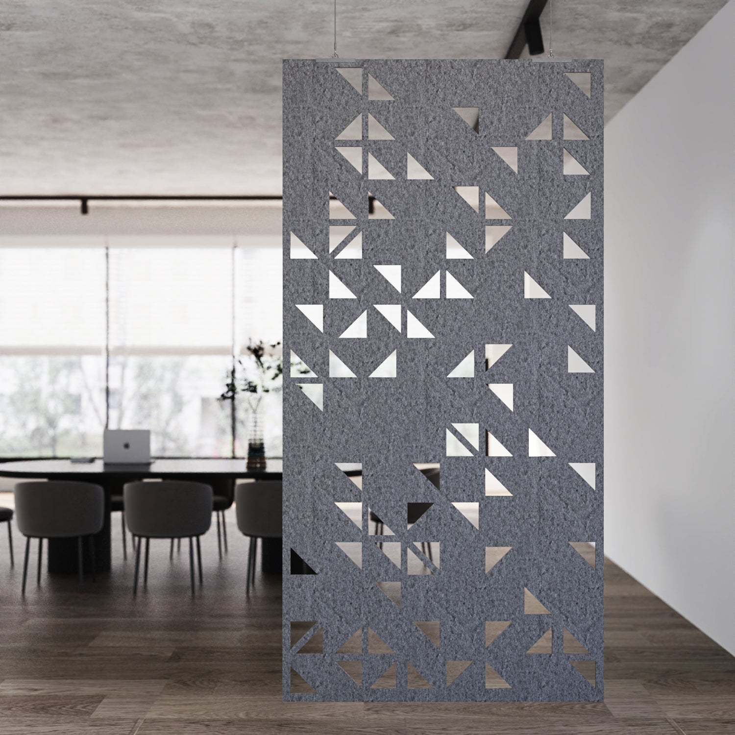 Decorative screen with geometric pattern in a modern interior setting