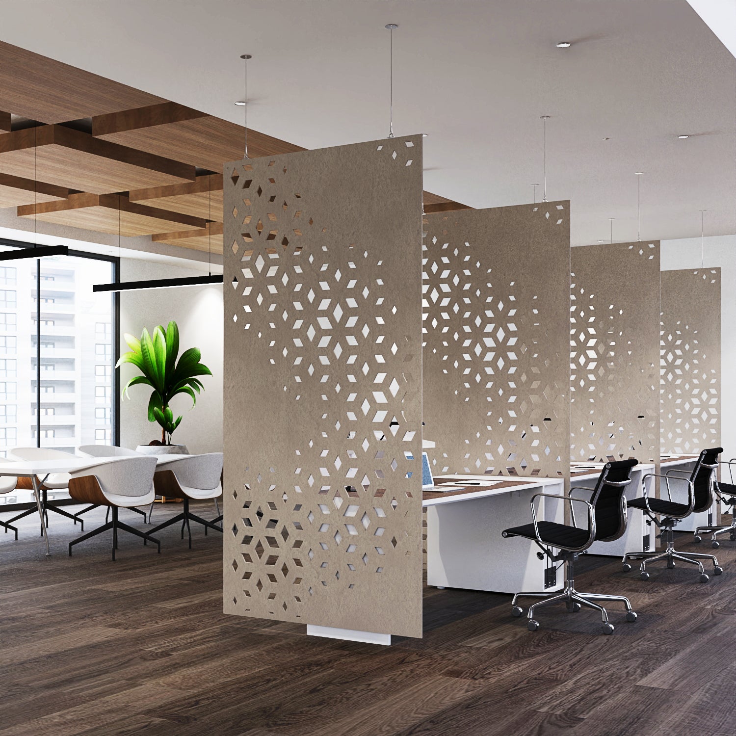 Modern office space with perforated partition walls and office chairs.