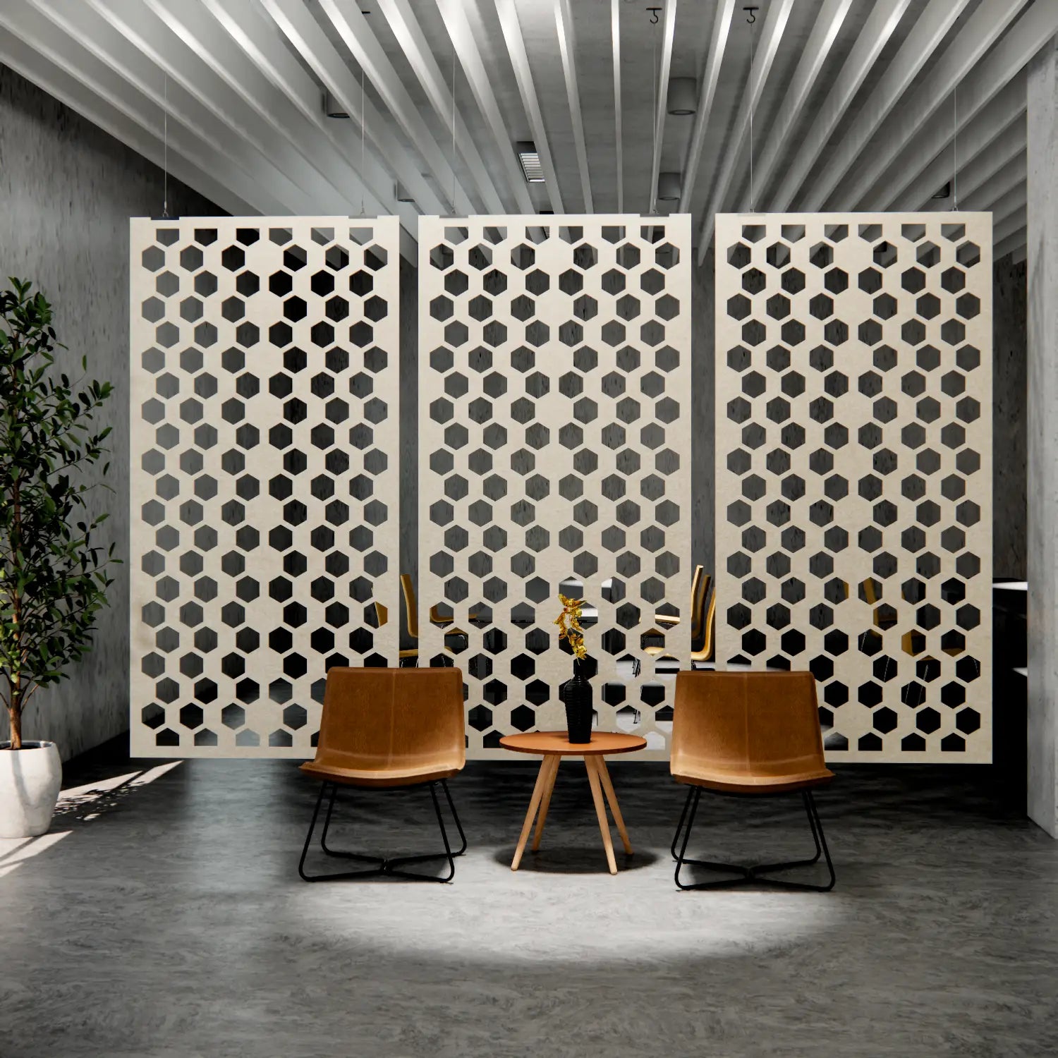 Modern interior with hexagonal patterned panels, chairs, and a small table.