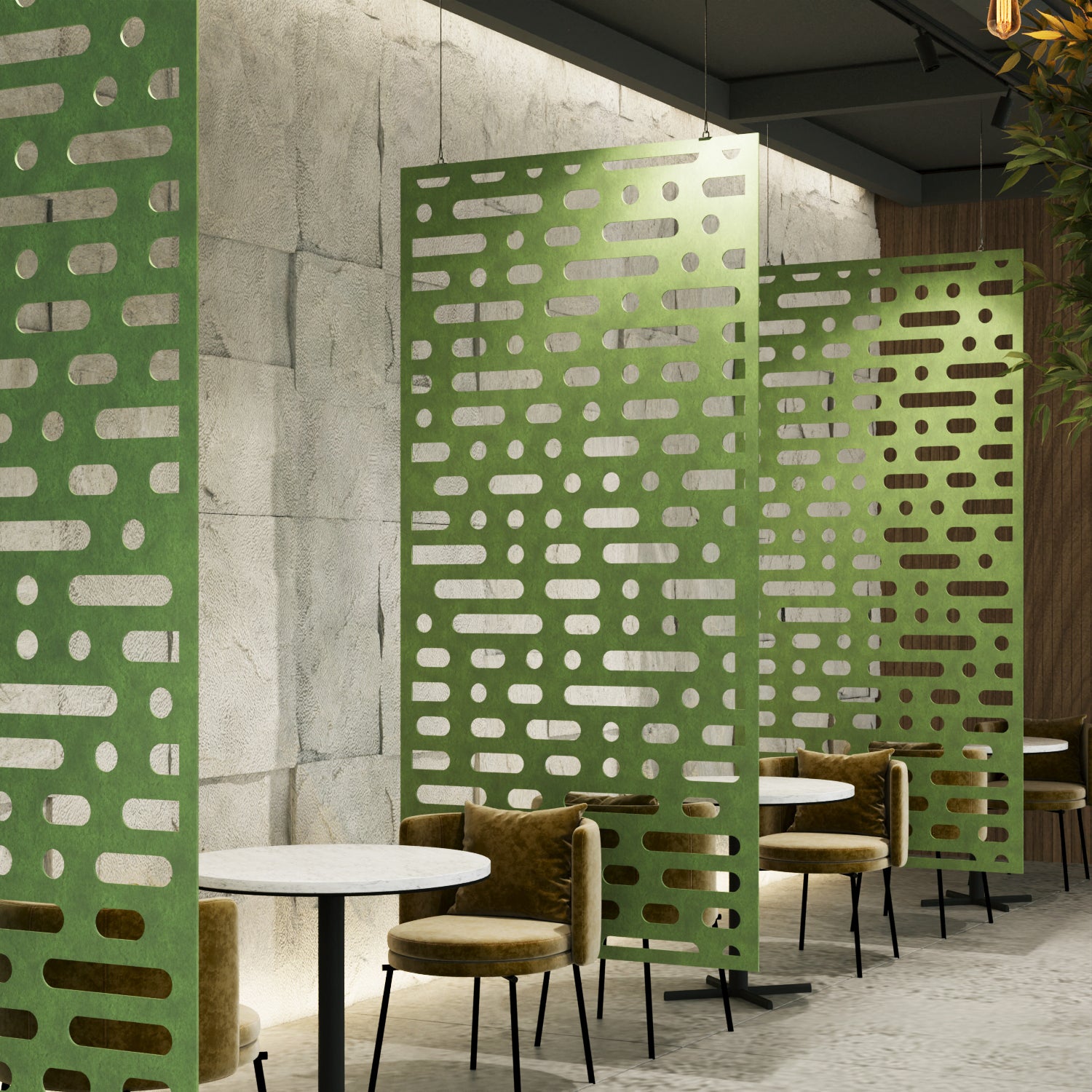 Modern interior with green perforated wall panels and round tables with chairs.