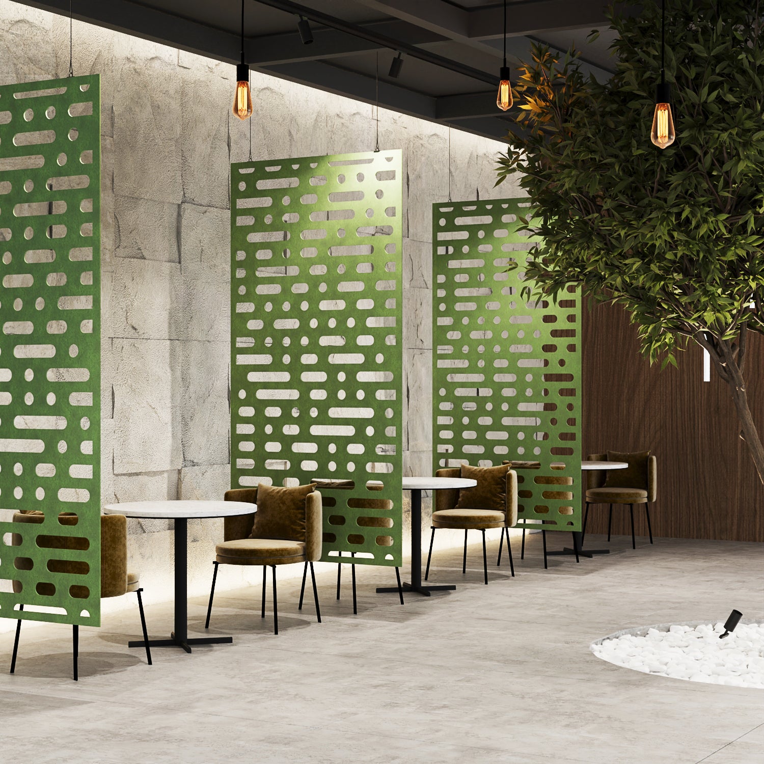 Modern interior with green perforated room dividers, tables, and chairs.