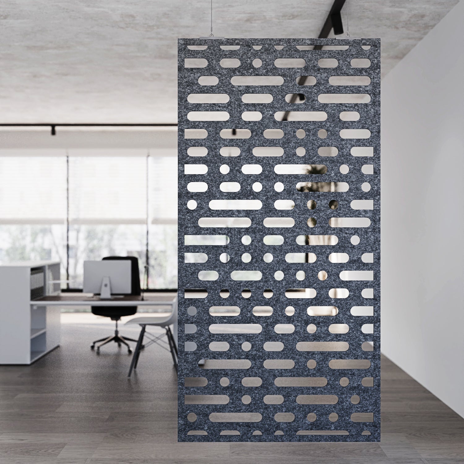 Decorative room divider with geometric pattern in an office setting