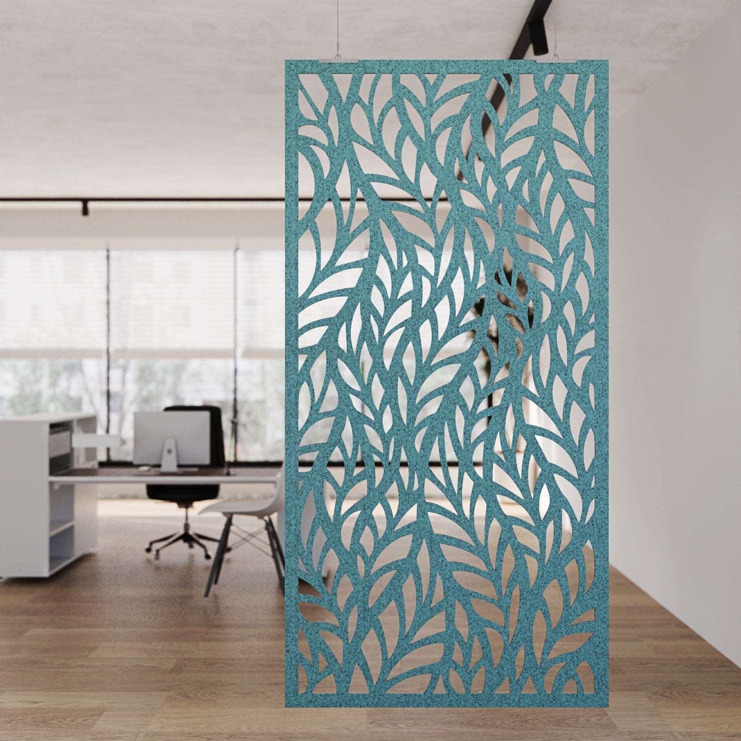 Decorative screen with leaf pattern in an office setting