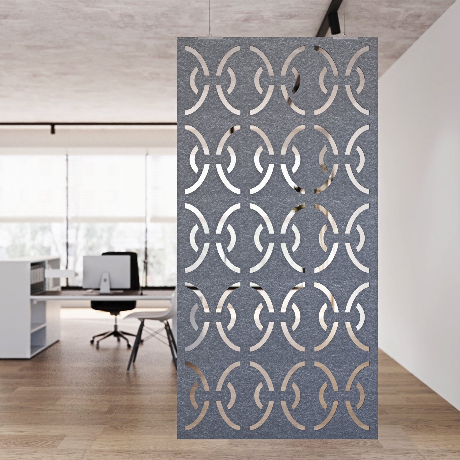 Decorative screen with geometric pattern in an office setting
