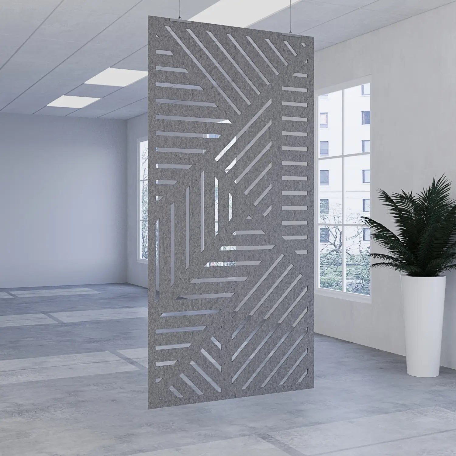 Decorative room divider with geometric pattern in an office setting