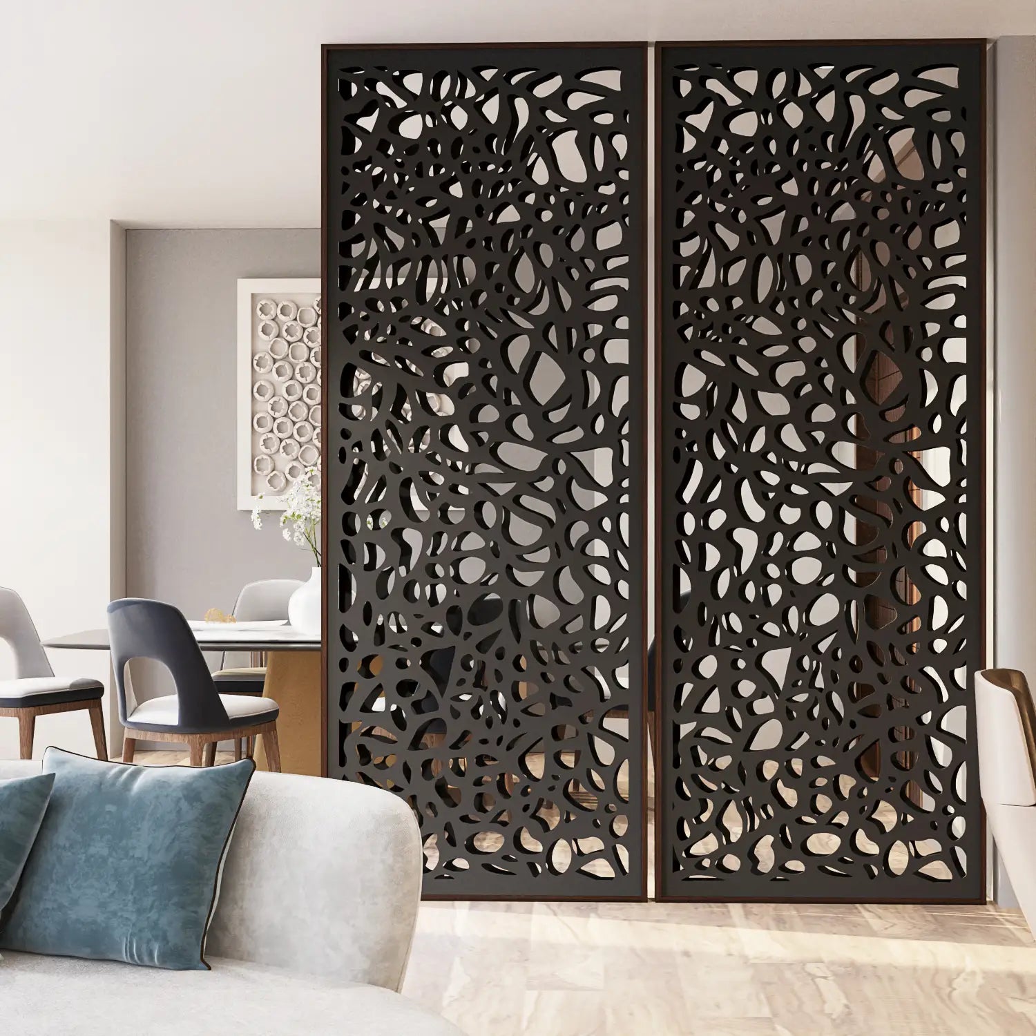 Decorative room divider screen in a living room setting