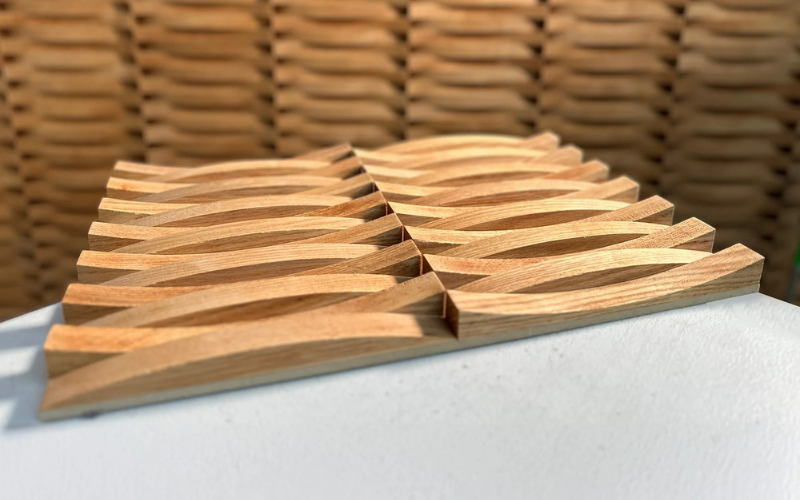 Wooden coaster set on a white surface with a woven basket background