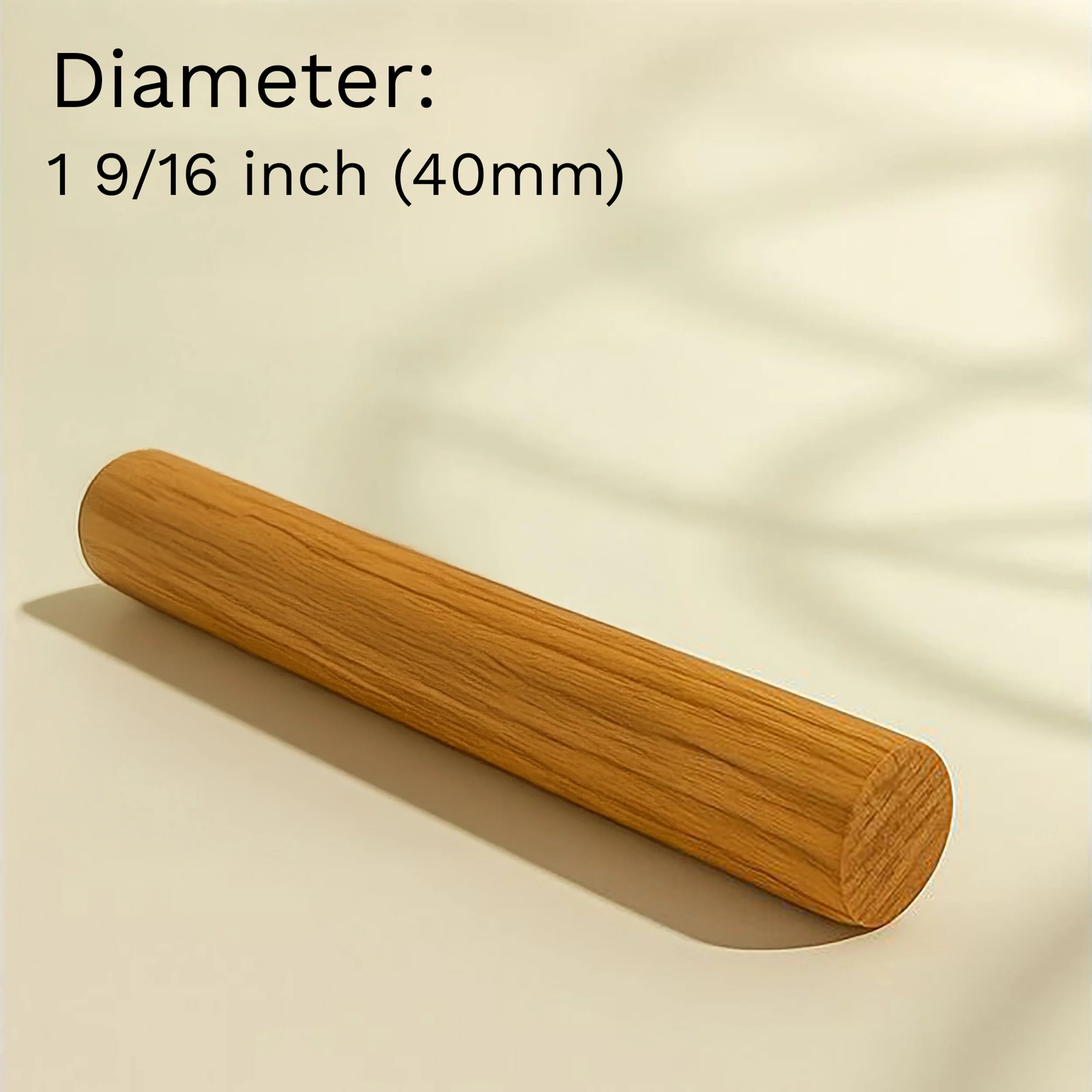 Wooden dowel rod with measurement text on a beige background