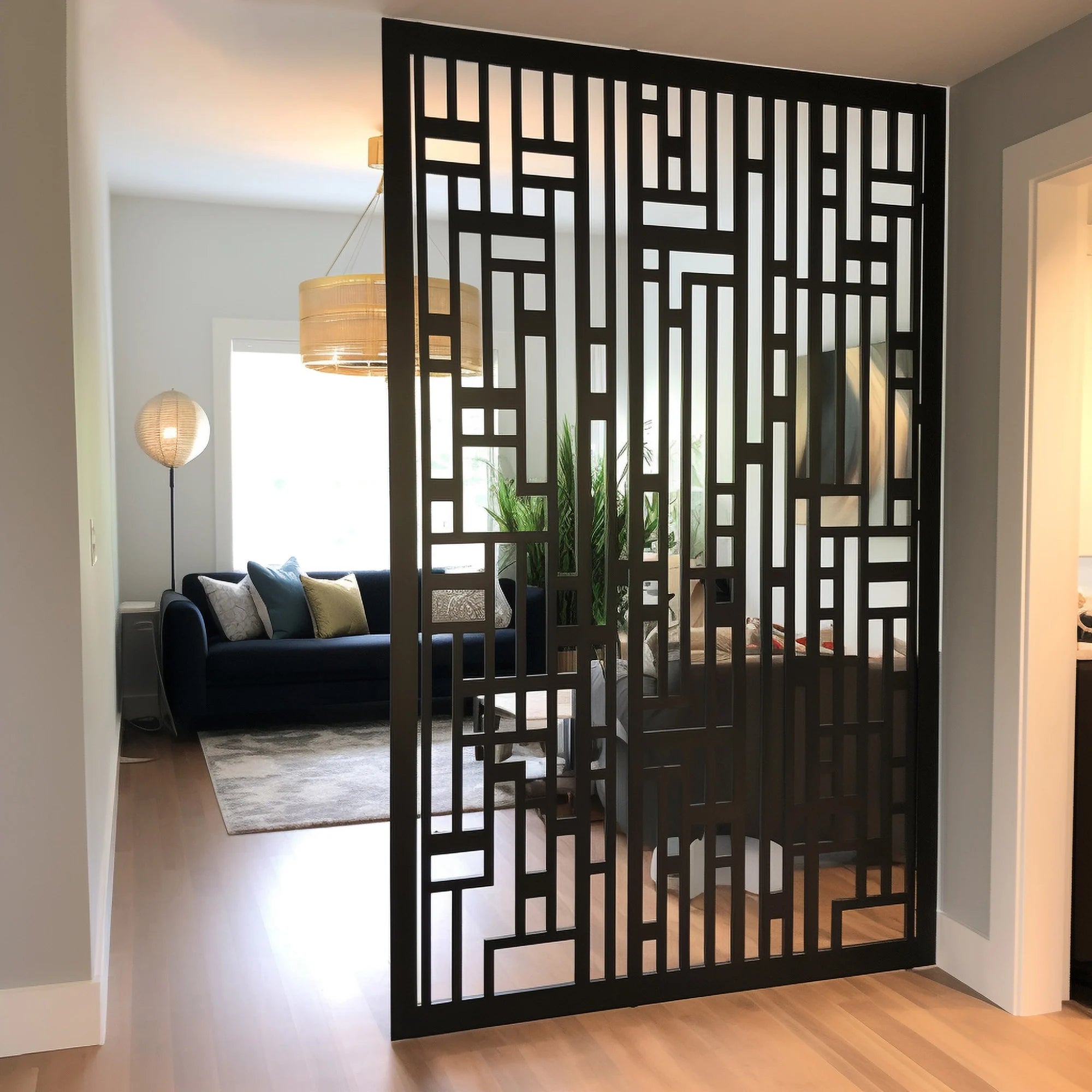Decorative black screen room divider in a living room setting