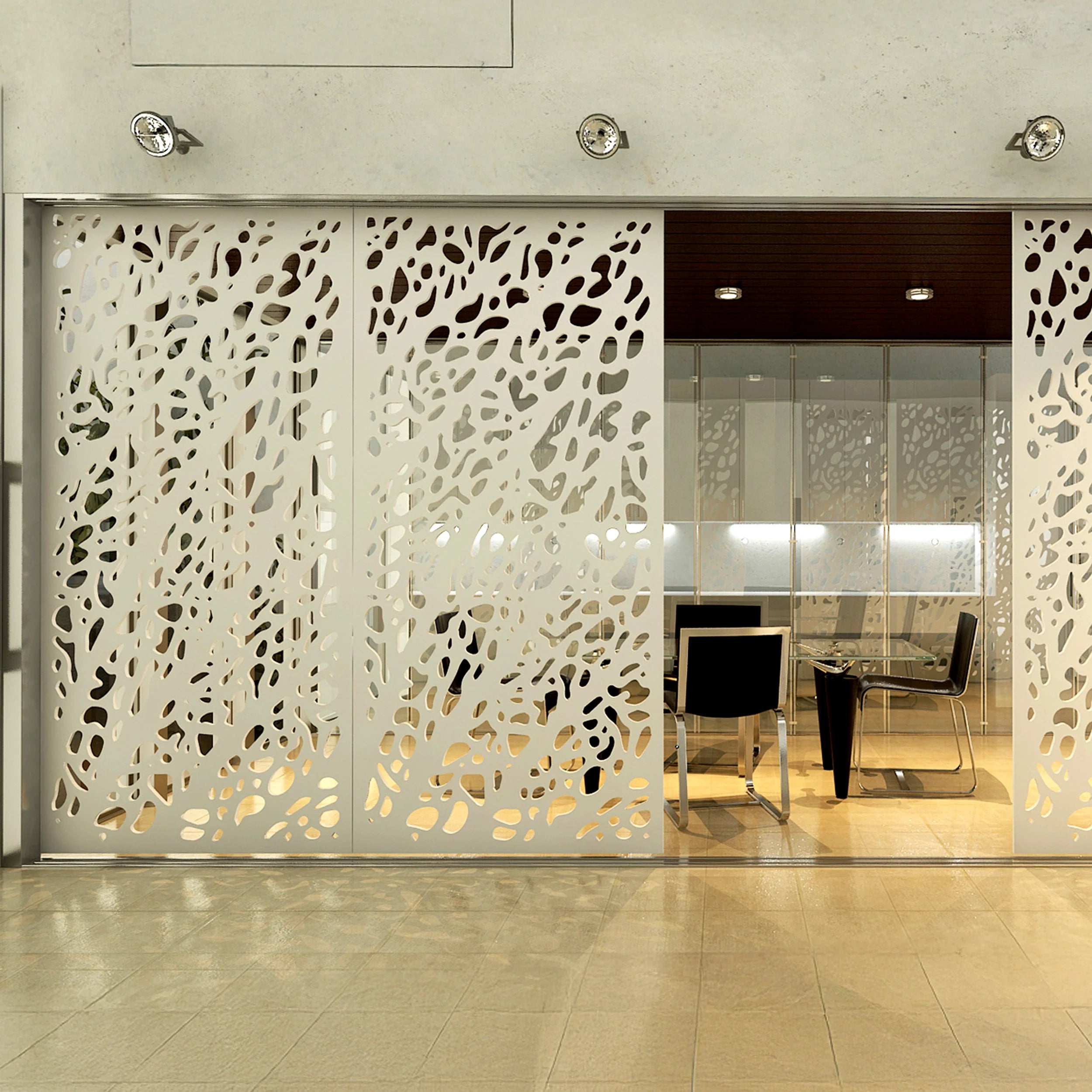Decorative screen with cut-out patterns in an indoor setting