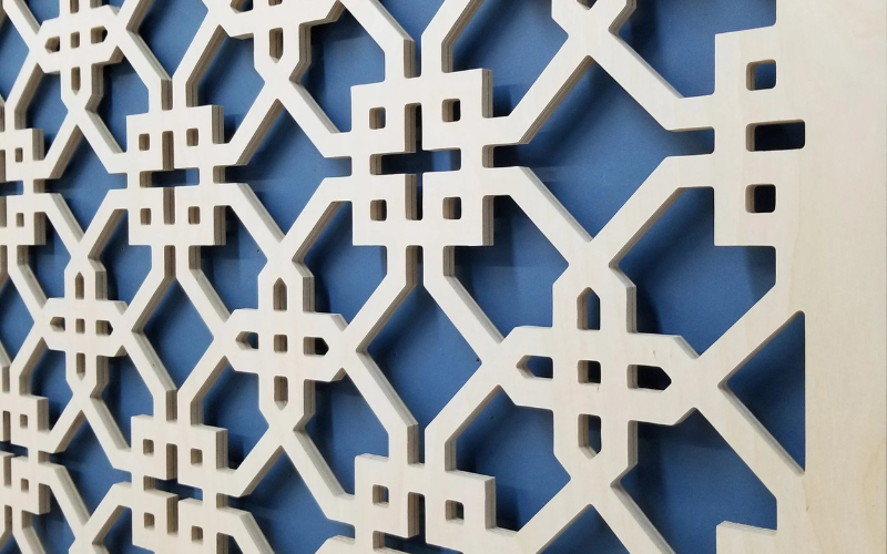 Decorative white lattice pattern on a blue background
