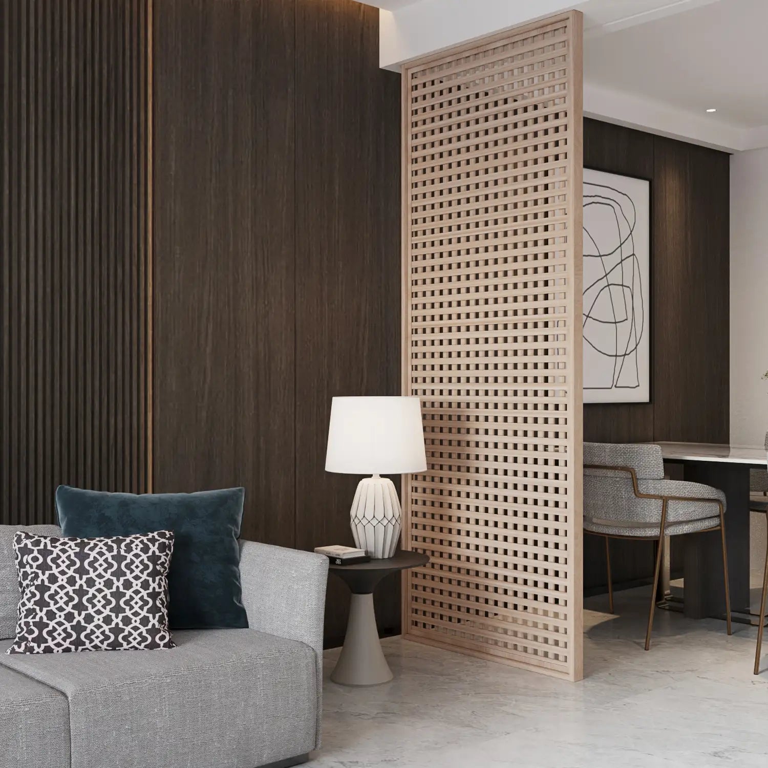 Modern living room with a gray sofa, decorative pillows, a lamp, and a wooden lattice screen.