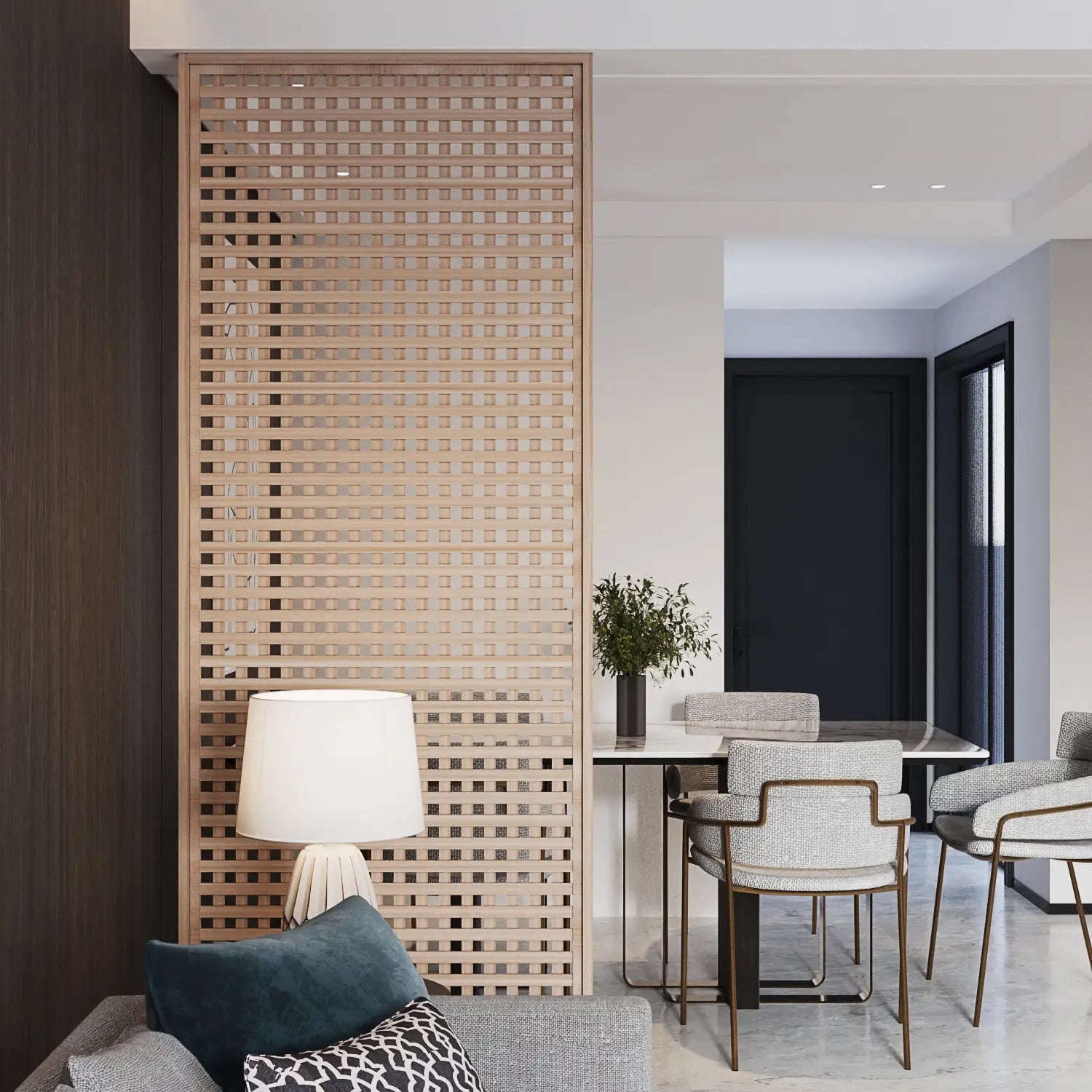 Modern interior with a woven wooden screen, gray sofa, and dining area.