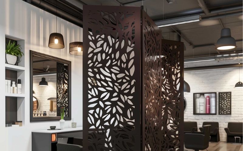 Decorative room divider in a modern office setting with shelves and mirrors.